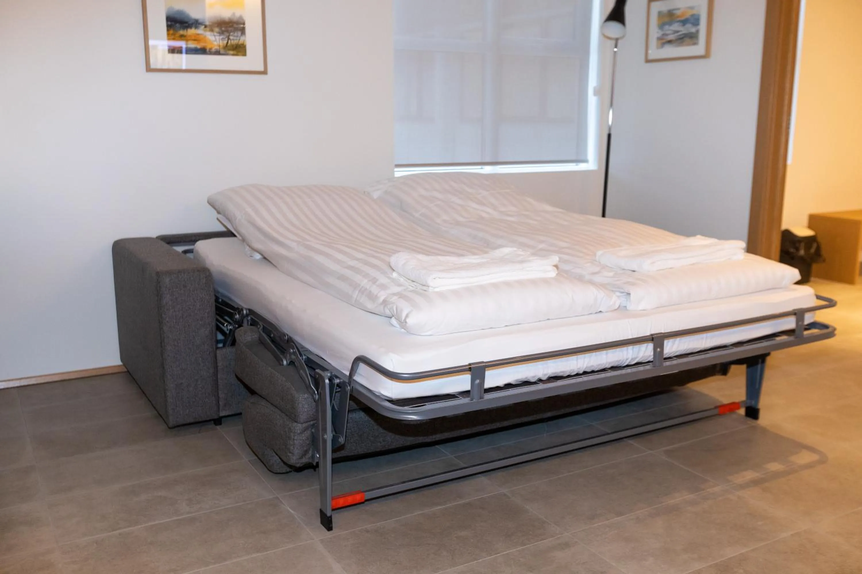 Bed in Hrimland Apartments