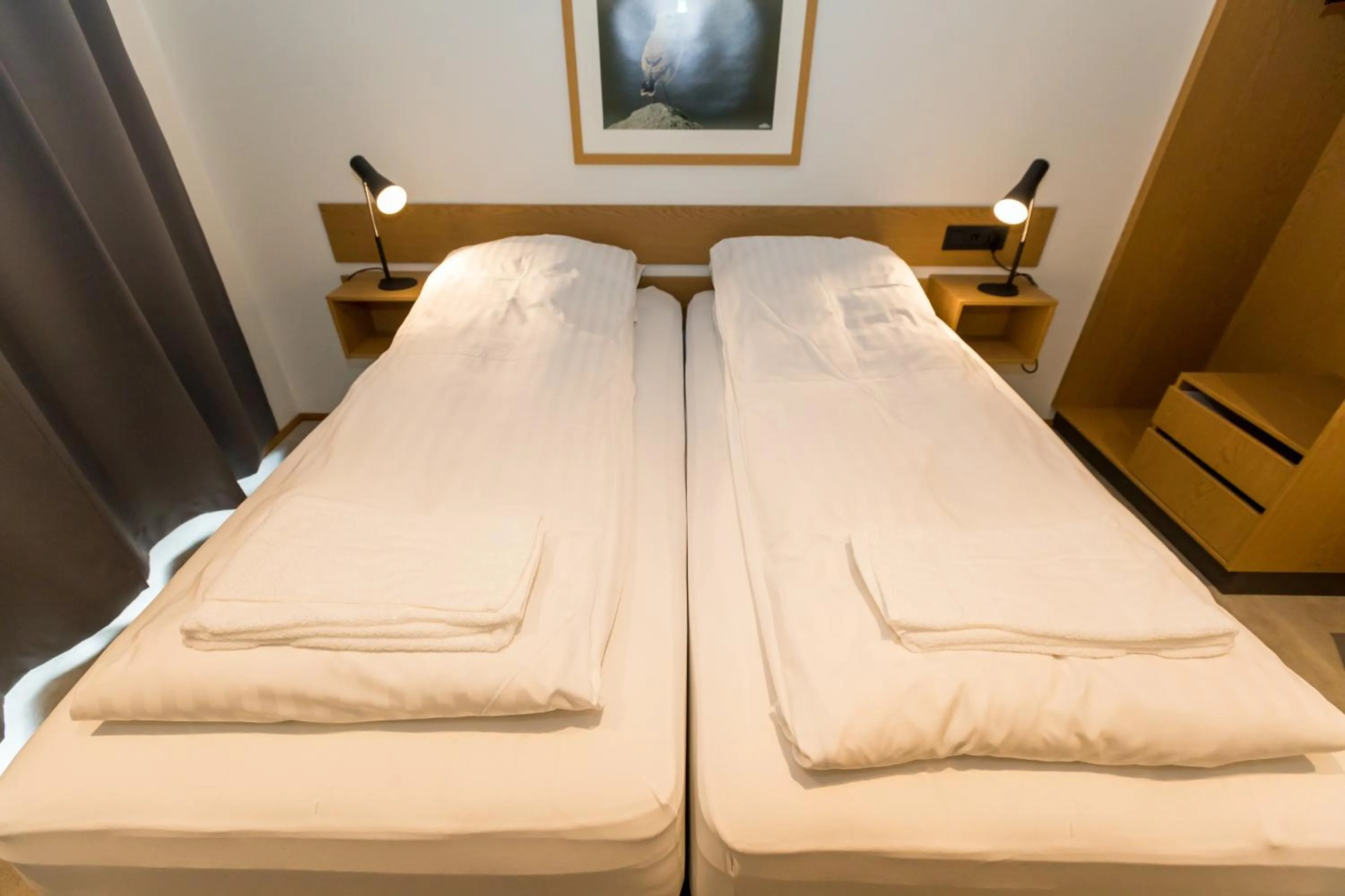 Bed in Hrimland Apartments