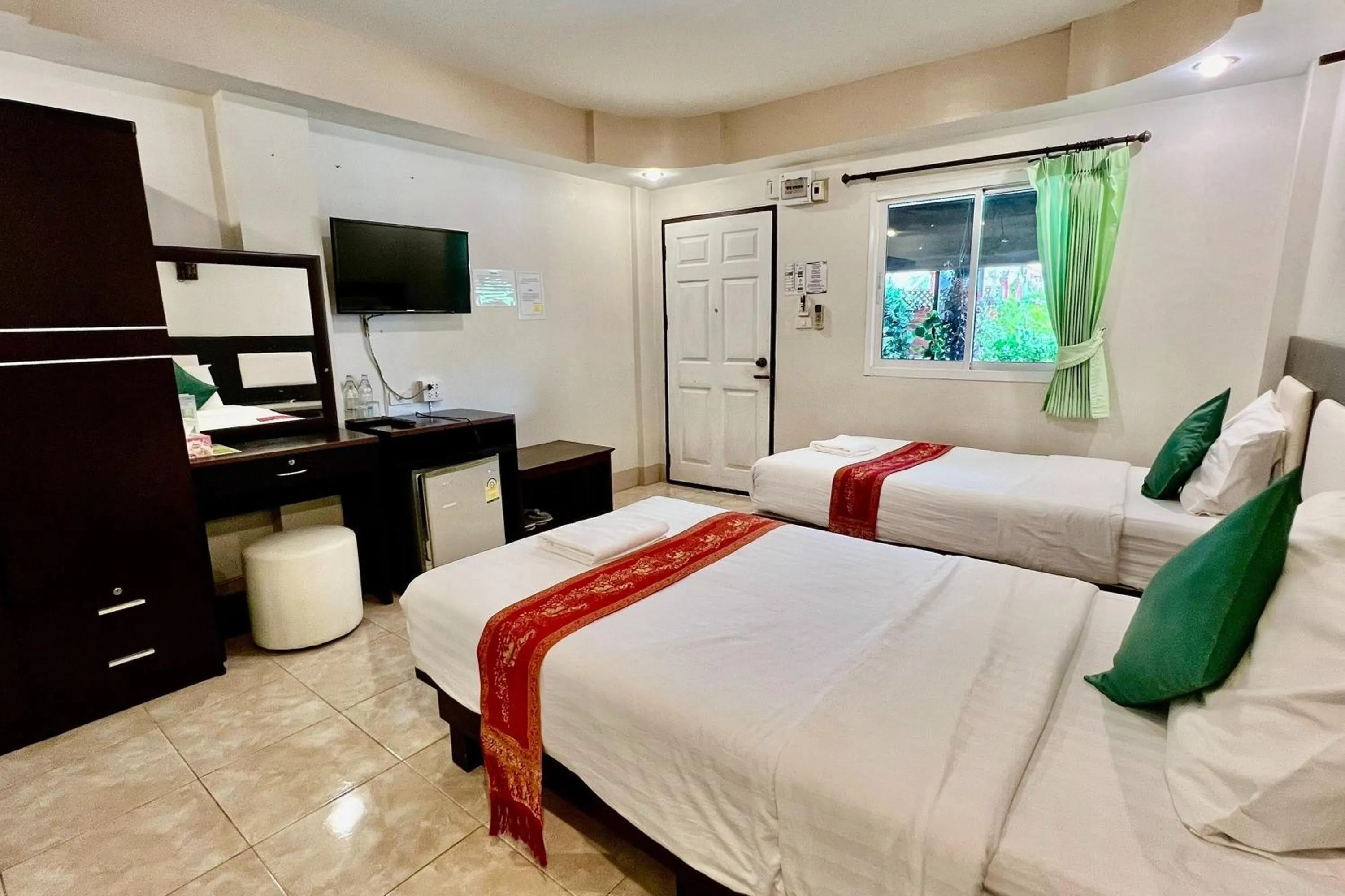 Photo of the whole room, Bed in Nan Thara Place