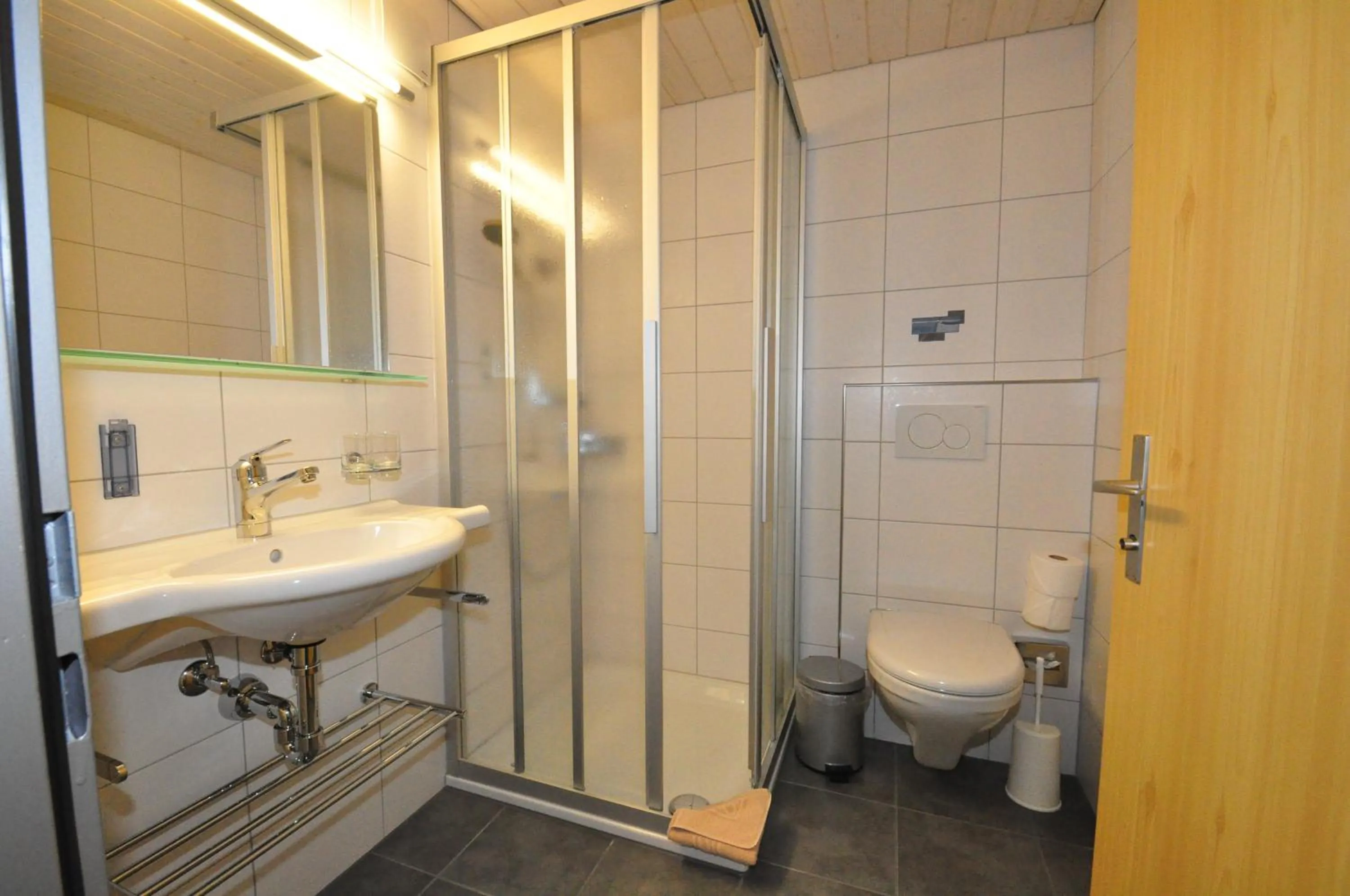 Bathroom in Ferien- und Familienhotel Alpina Adelboden