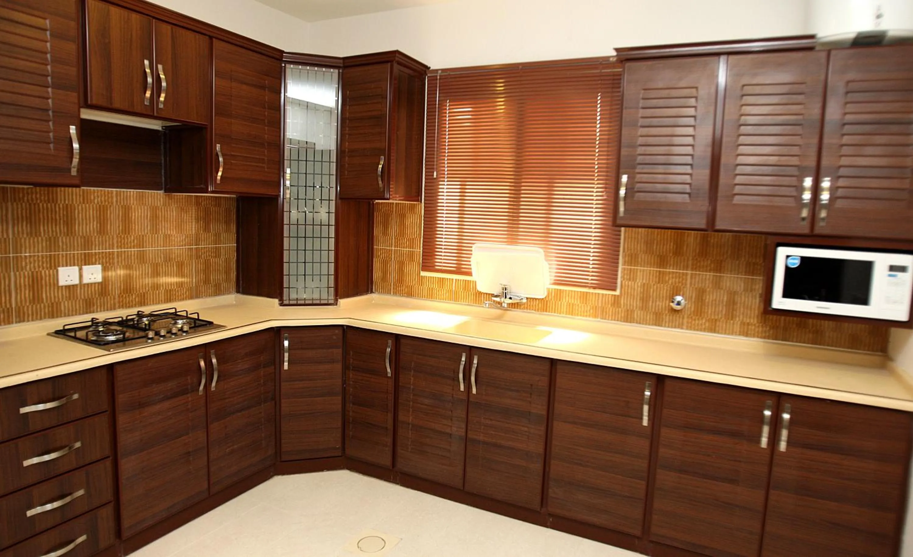 Kitchen or kitchenette in Rest Night Serviced Apartments - Al Nafal