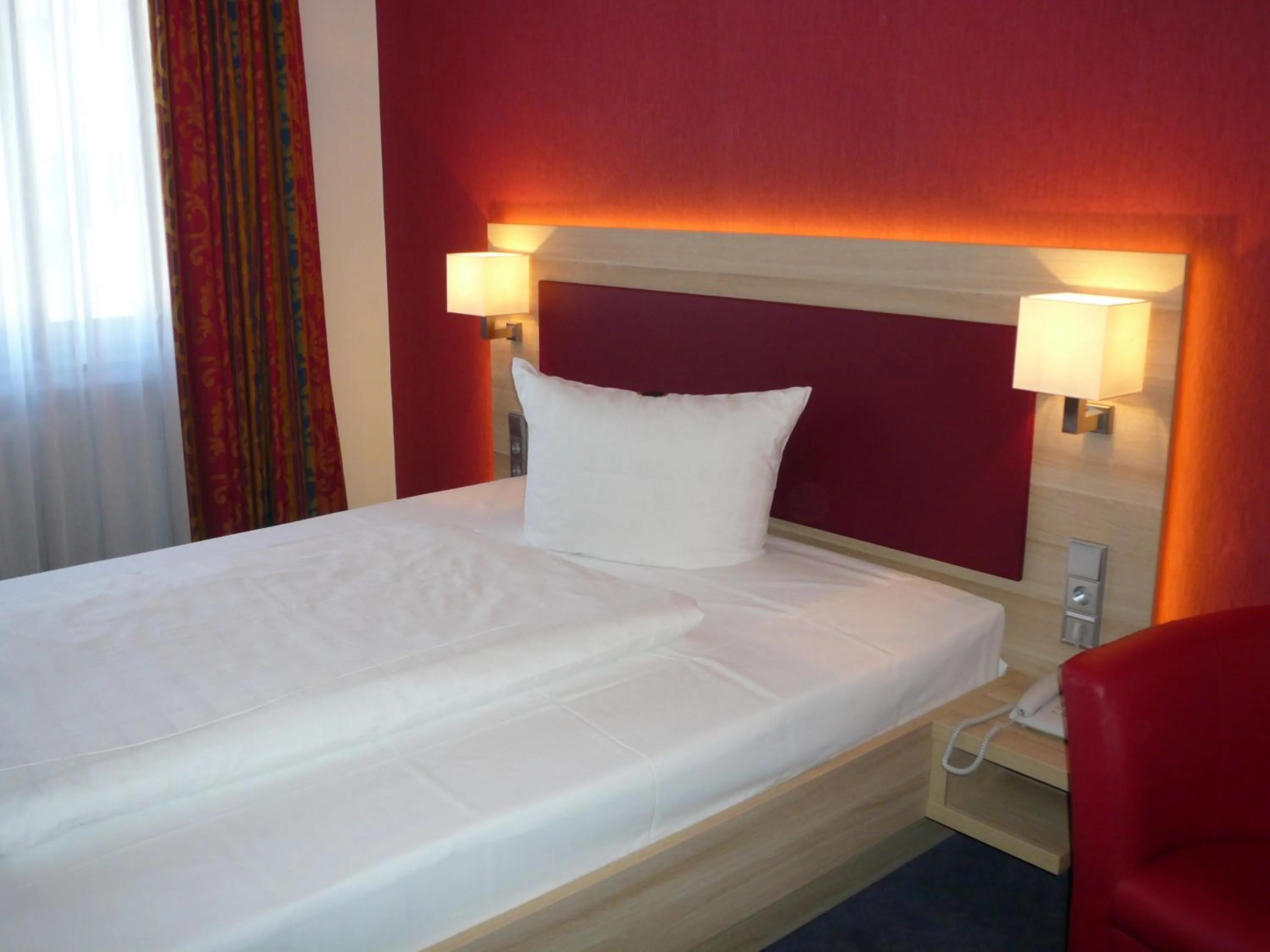 Bed in Hotel Kaiserhof