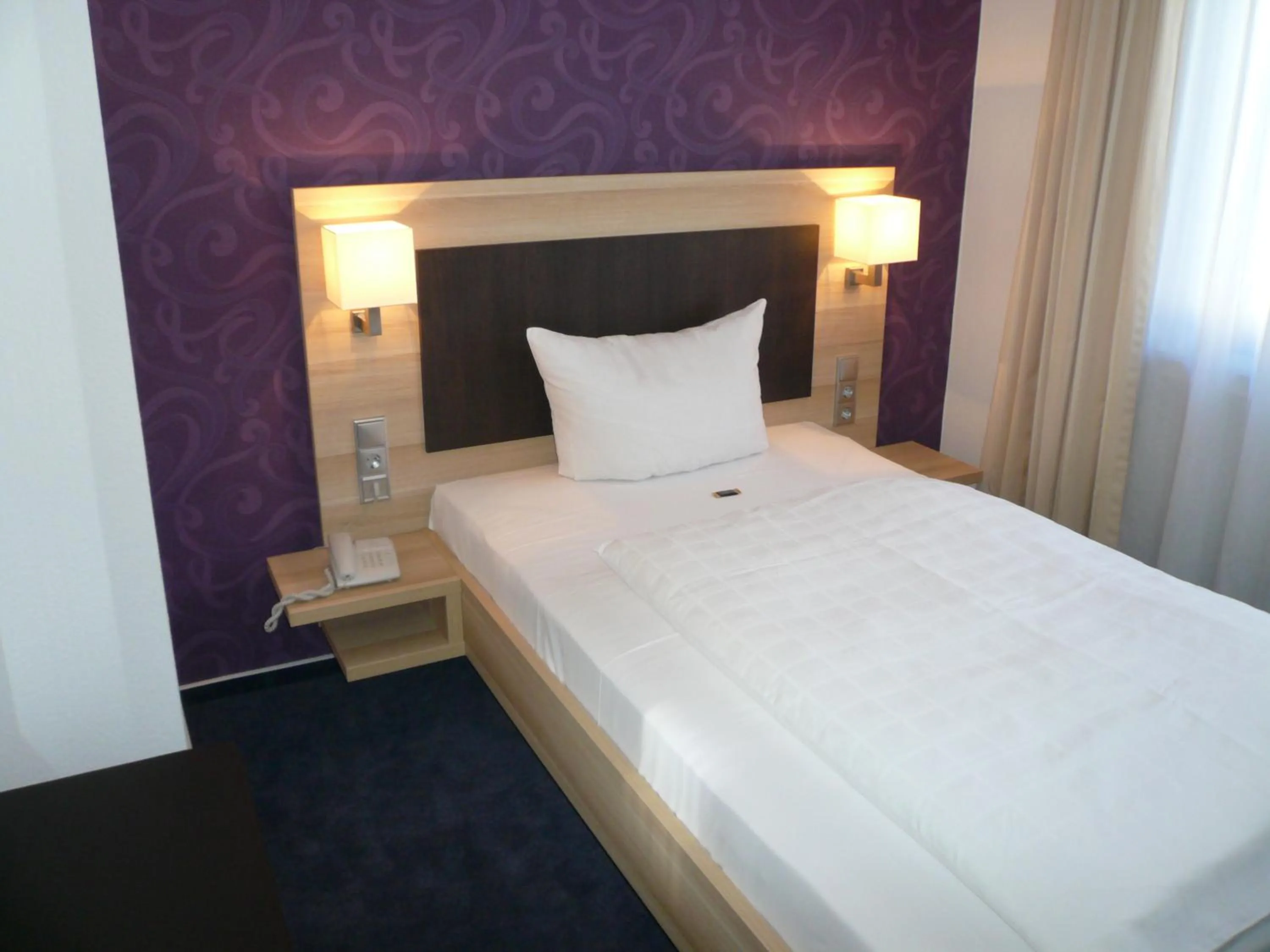 Bed in Hotel Kaiserhof