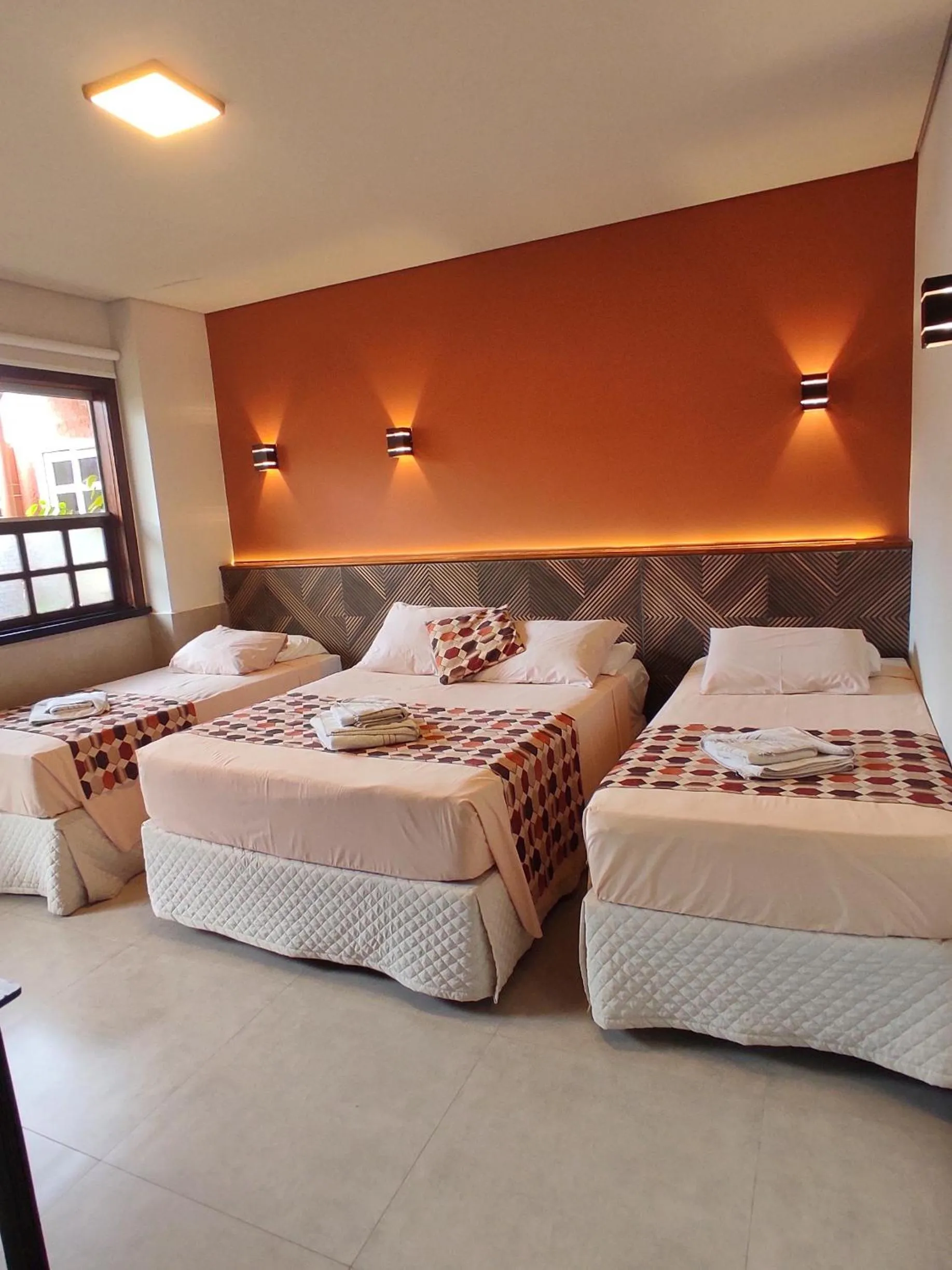 Bed in Pousada Novo Prado