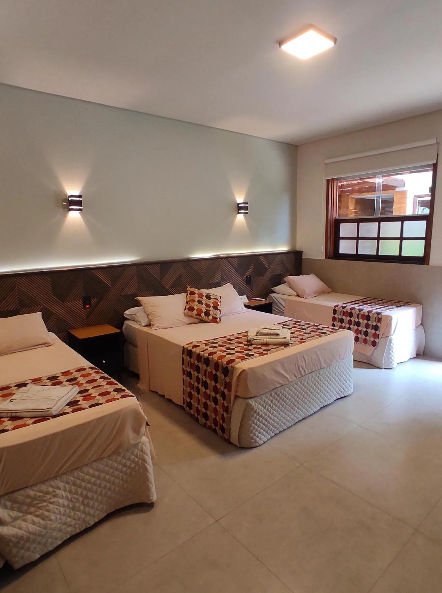 Bed in Pousada Novo Prado