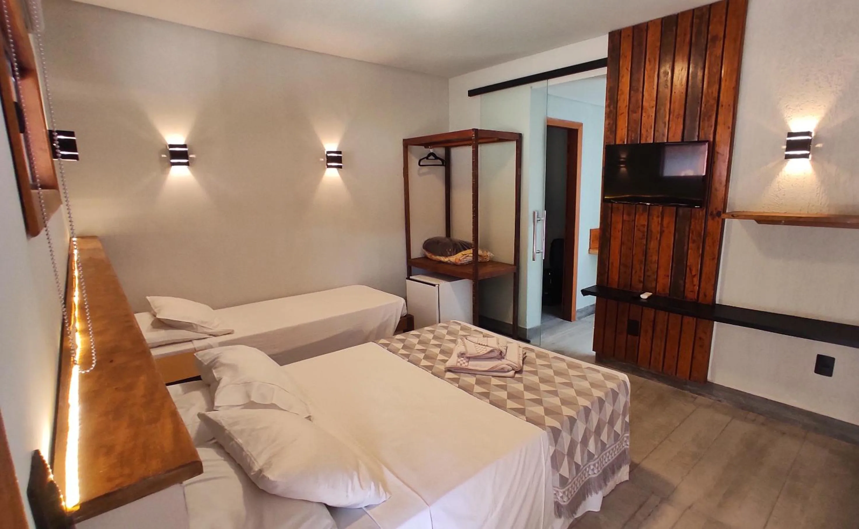 Bed in Pousada Novo Prado