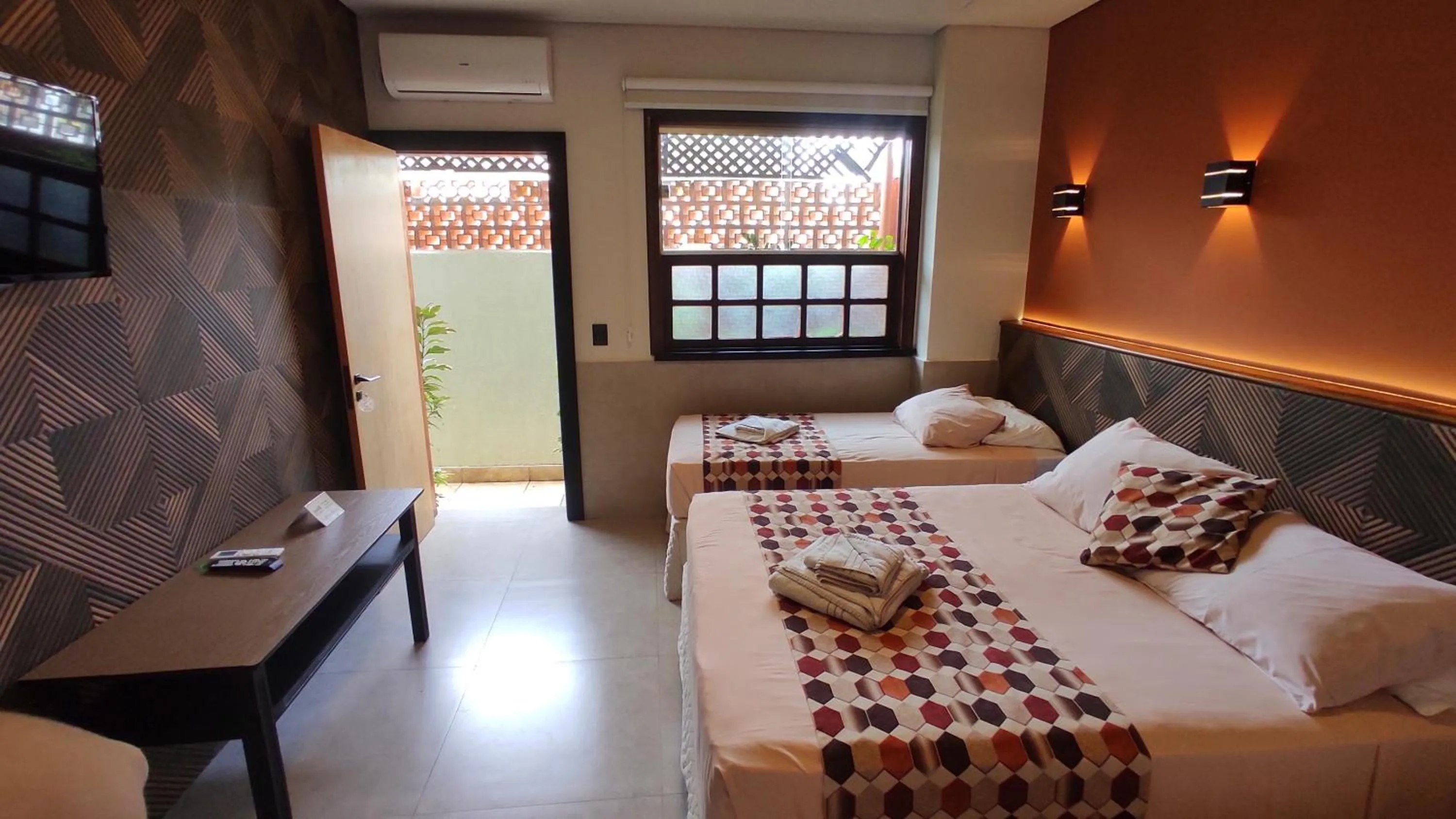 Bed in Pousada Novo Prado