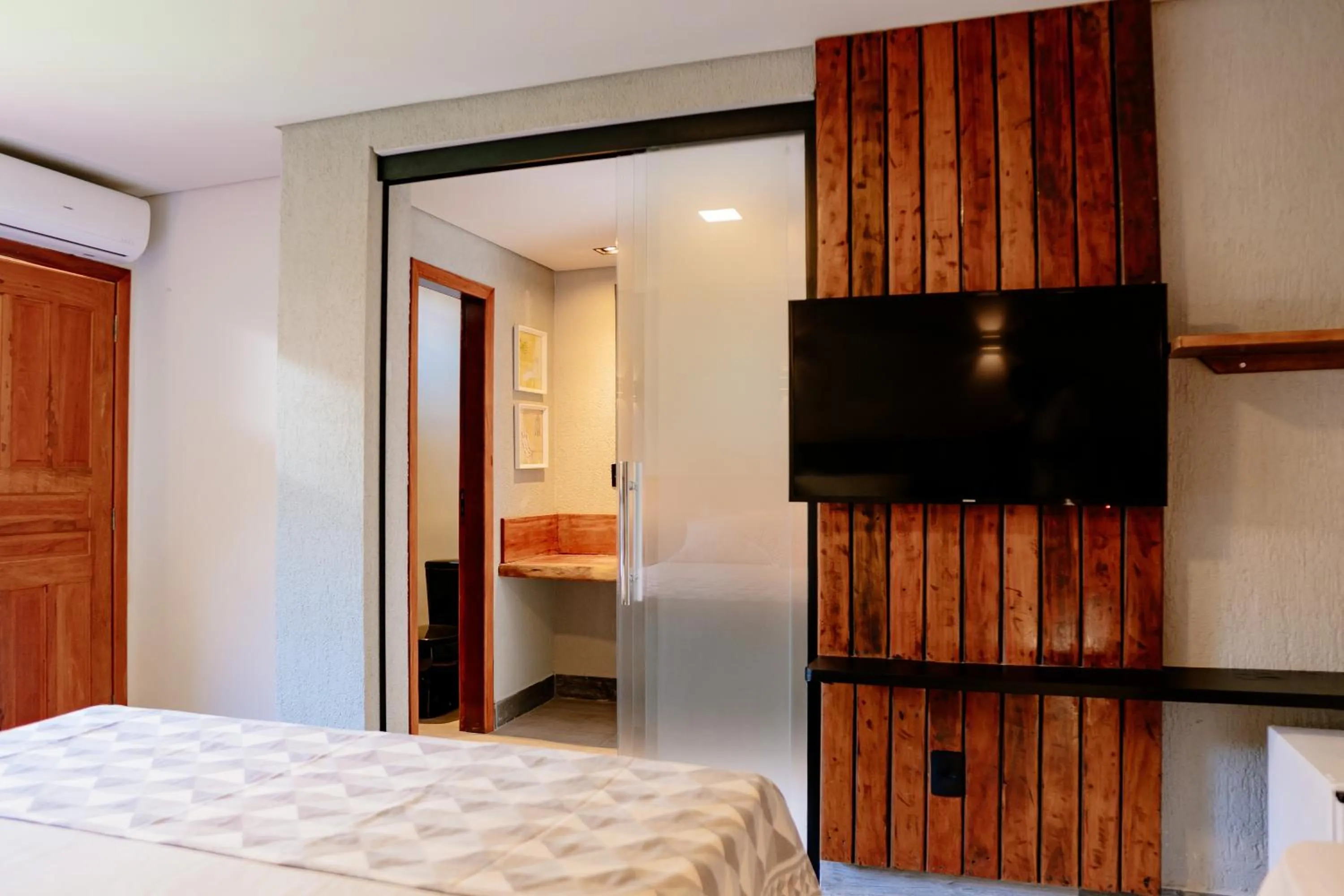 Bed in Pousada Novo Prado