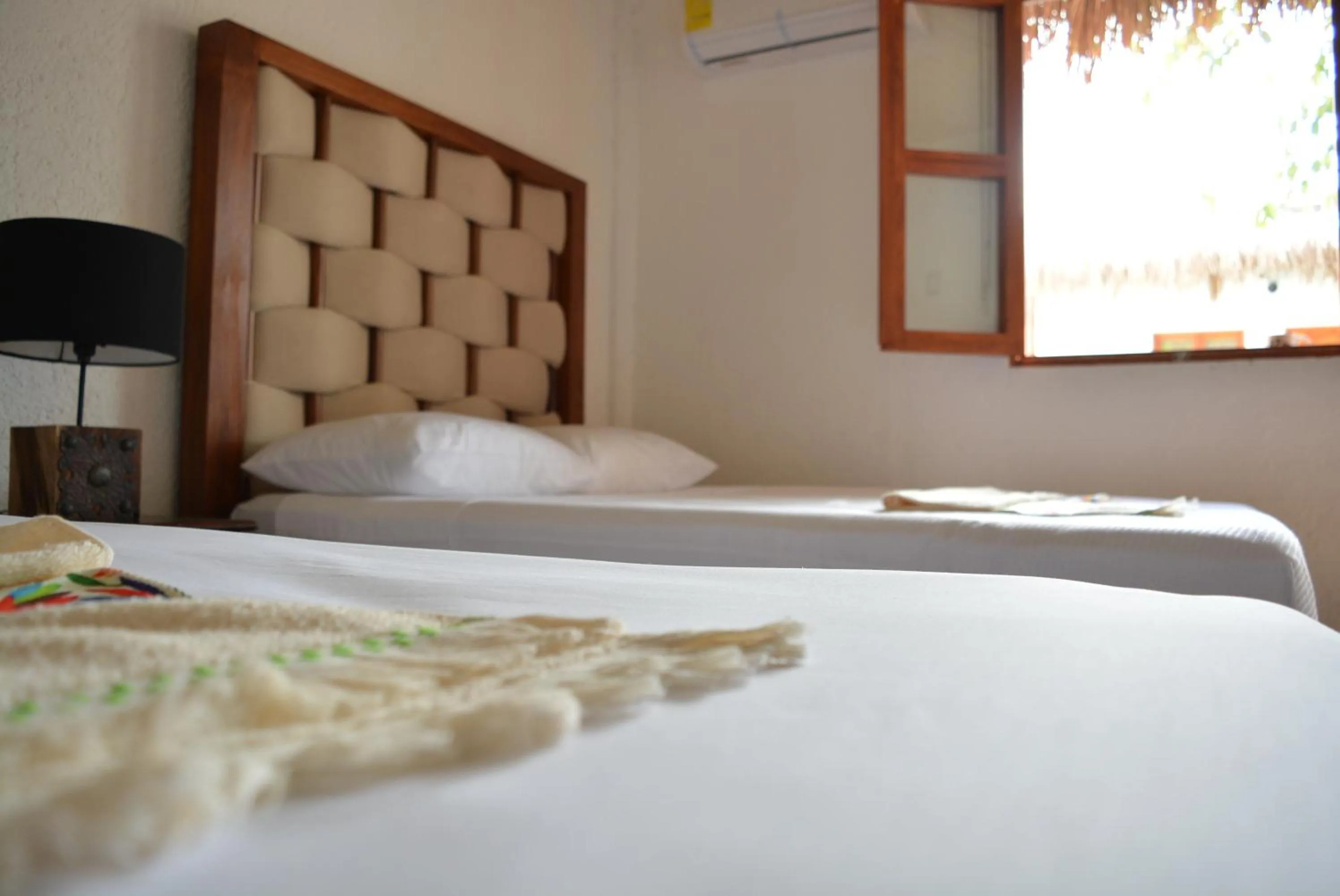 Bed in Kinta Kan Hotel Cozumel