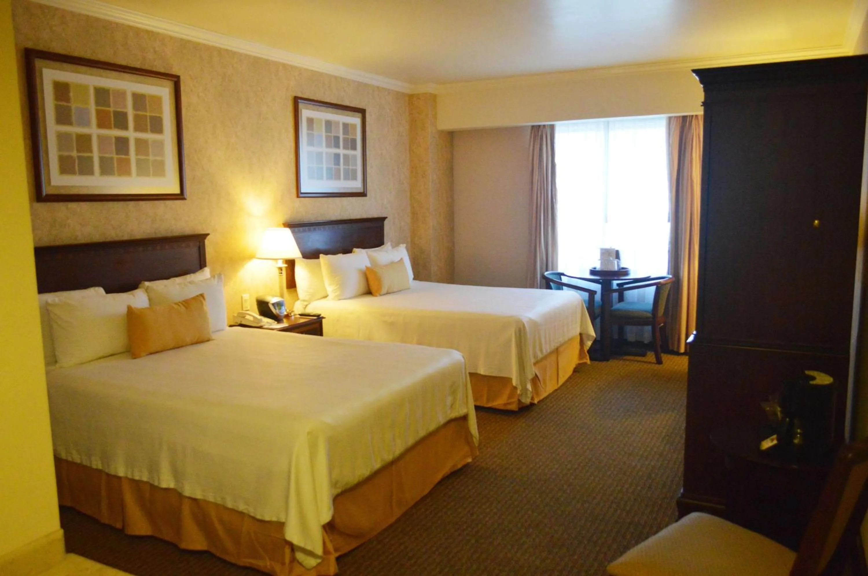 Photo of the whole room, Bed in Best Western PLUS Nuevo Laredo Inn & Suites