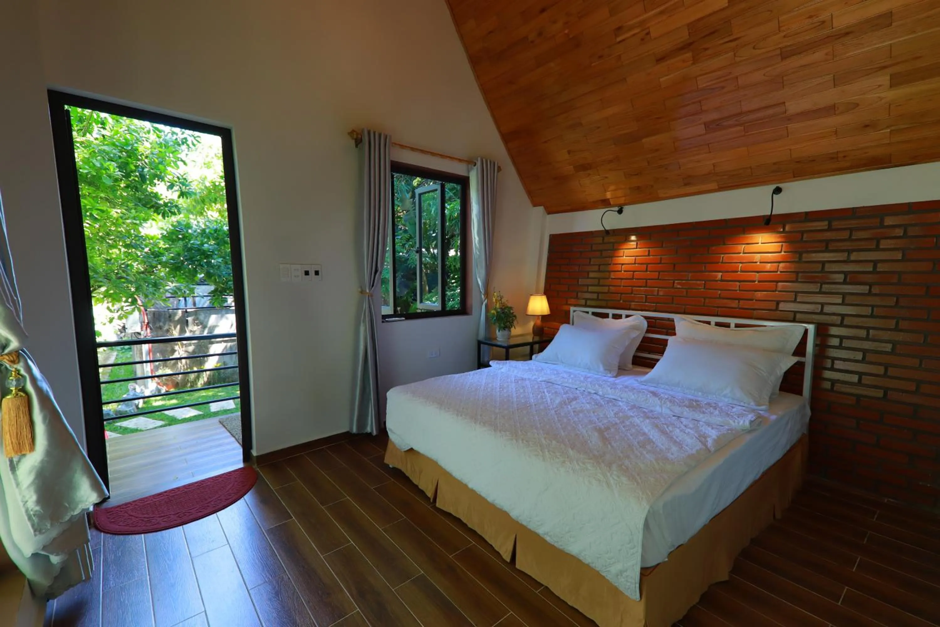 Bedroom, Bed in Tropical Valley Homestay - Villas