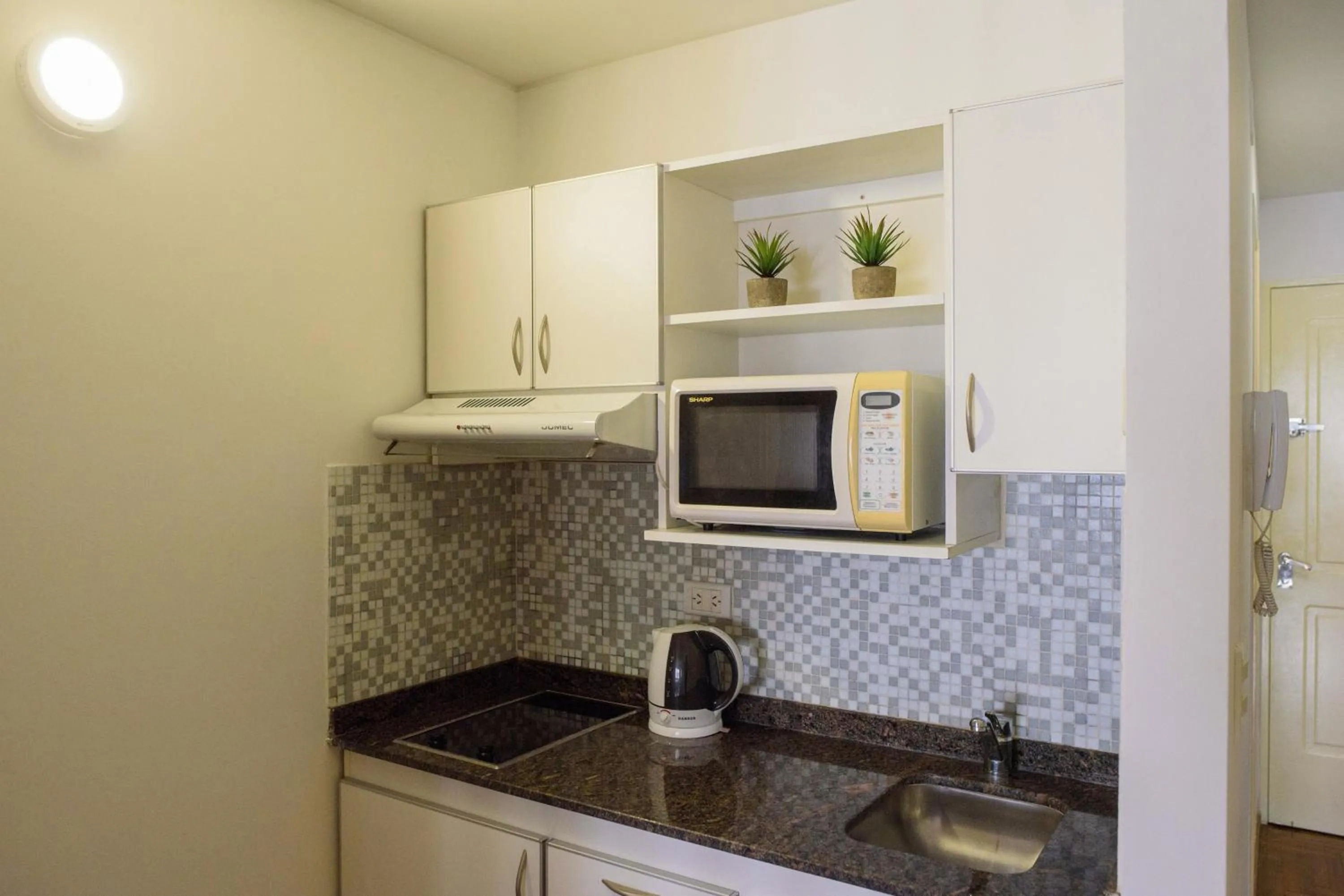 Kitchen or kitchenette in Departamentos Lugar