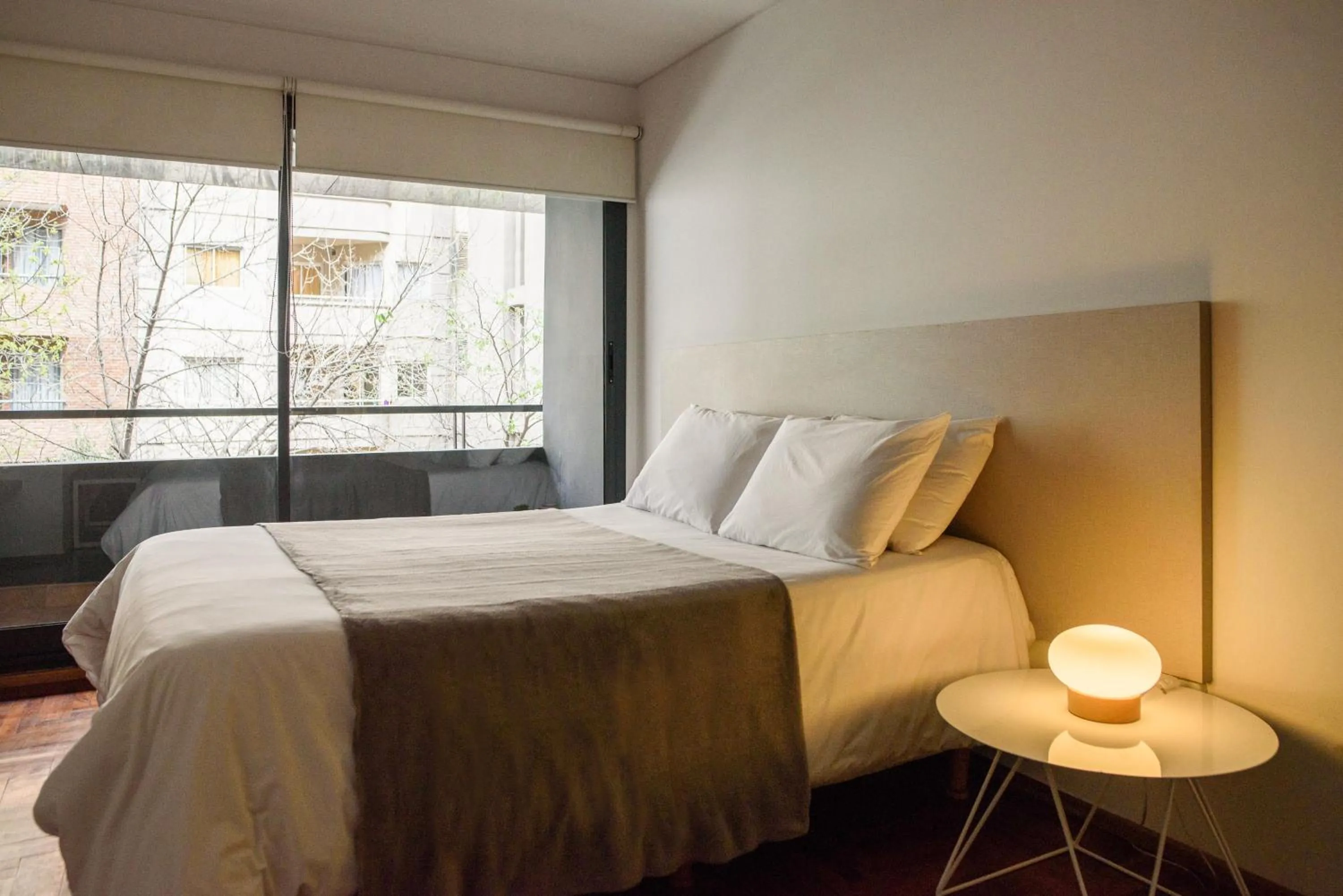 Bed in Departamentos Lugar