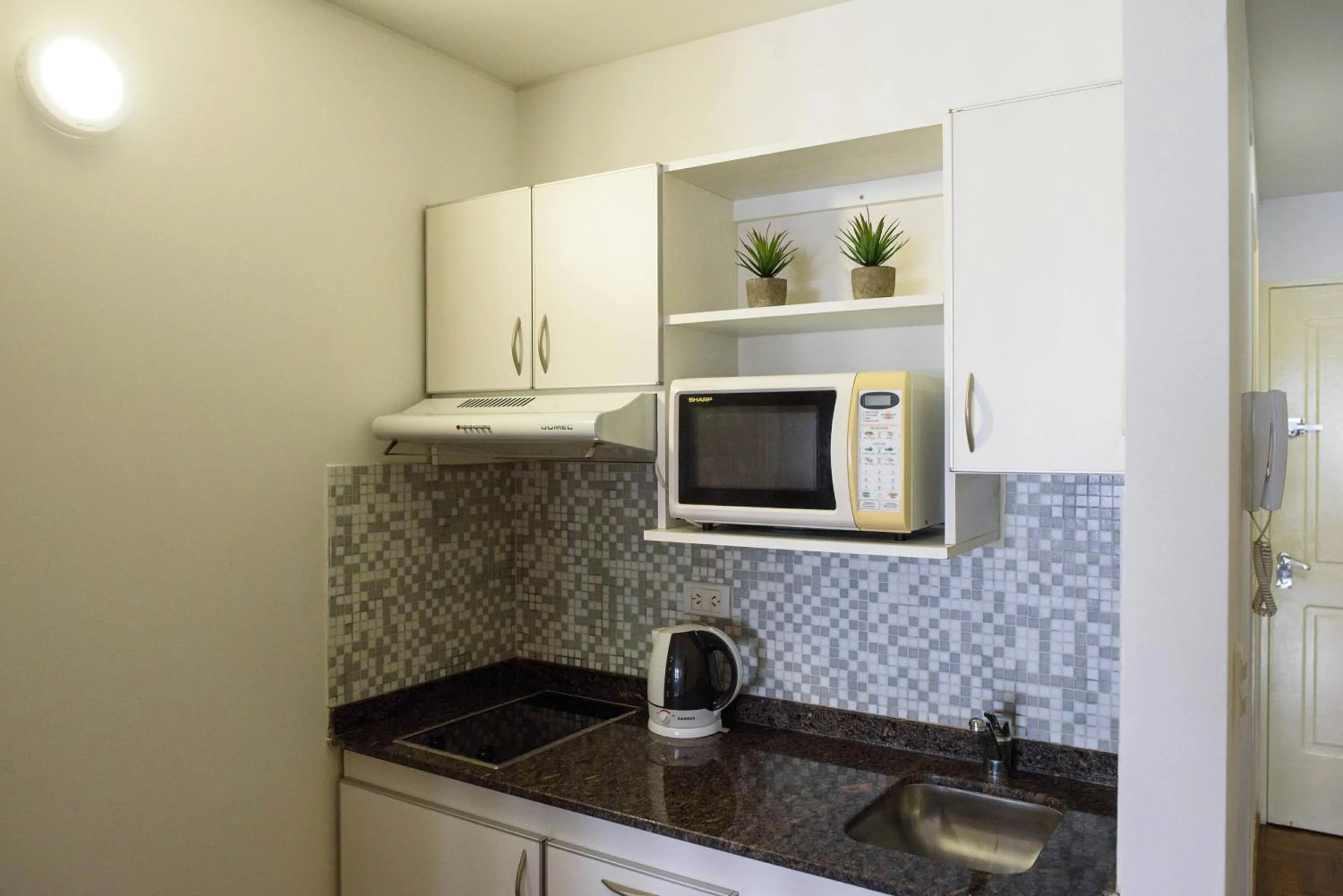 Kitchen or kitchenette in Departamentos Lugar