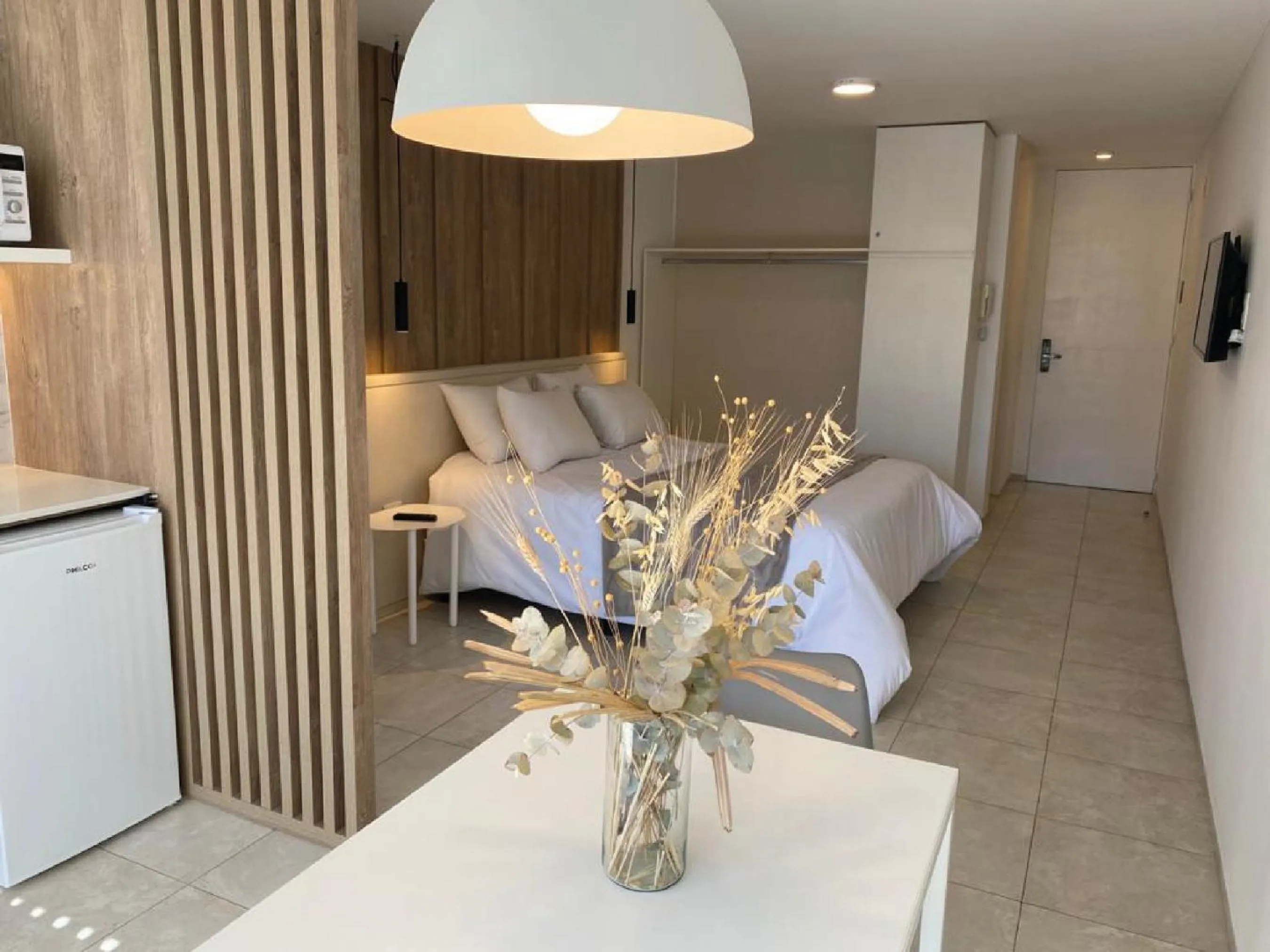 Photo of the whole room in Departamentos Lugar