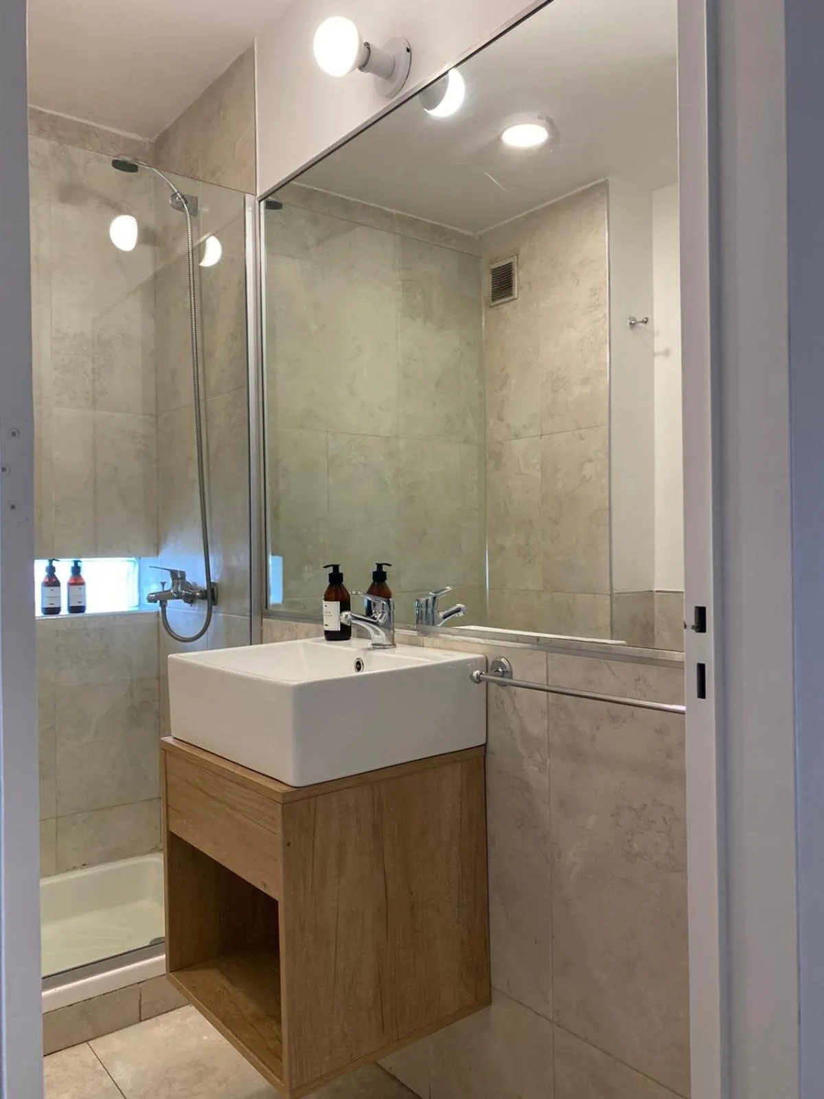 Bathroom in Departamentos Lugar