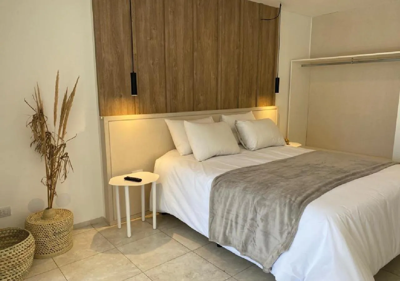 Bed in Departamentos Lugar