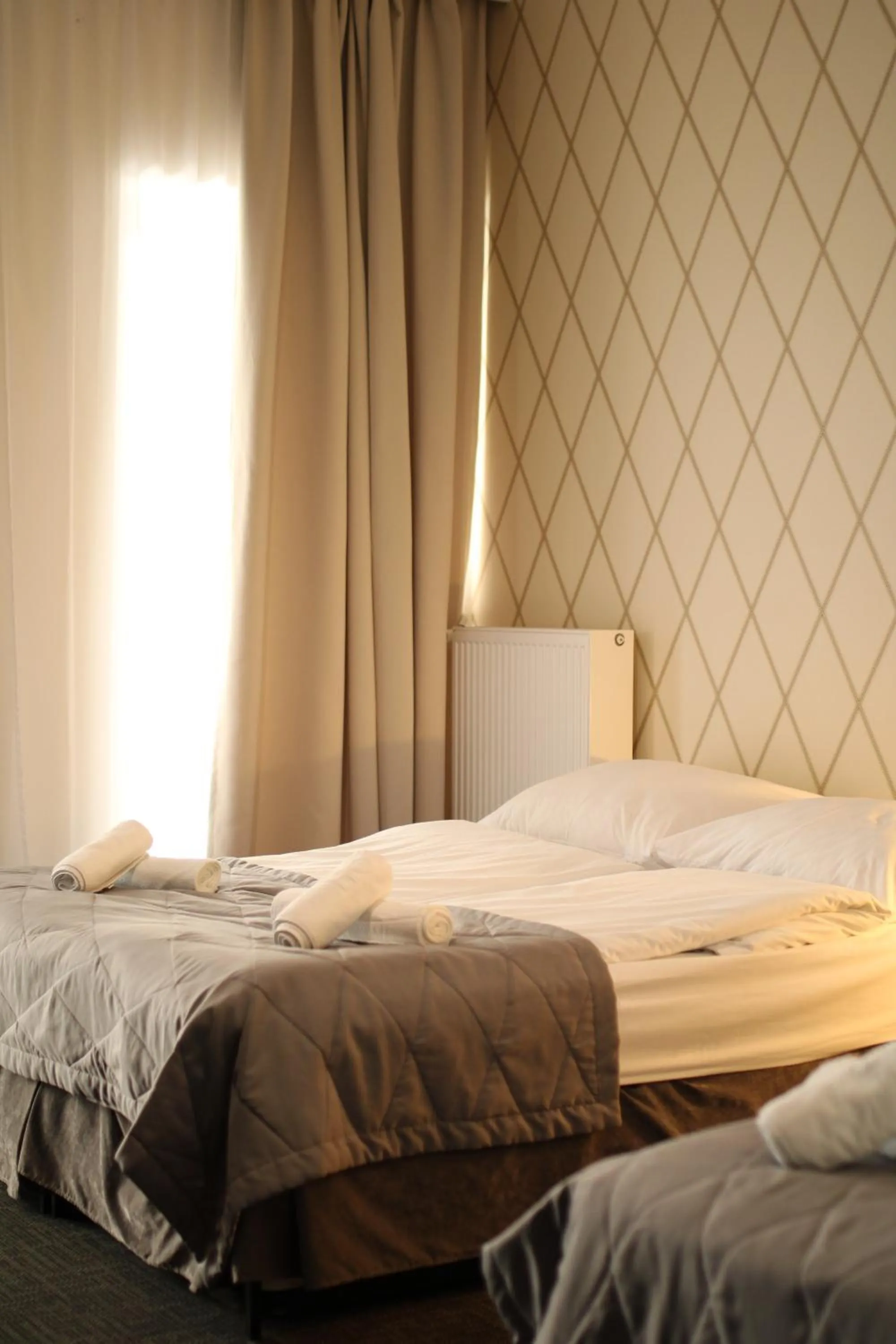 Bed in Arboretum Hotel