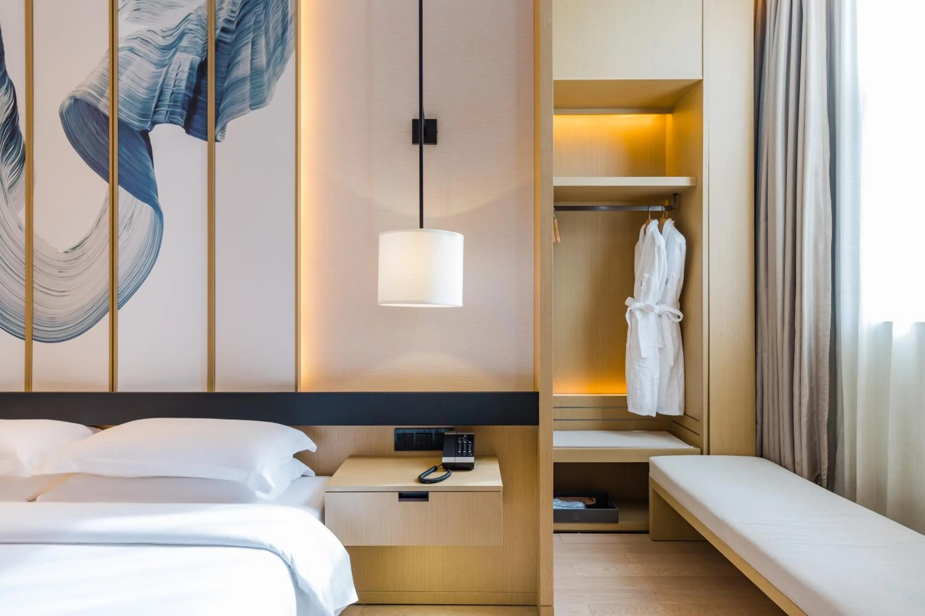 Bed in Yun He Ye Bo Hotel (Shanghai International Tourist Resort Wild Animal Park)