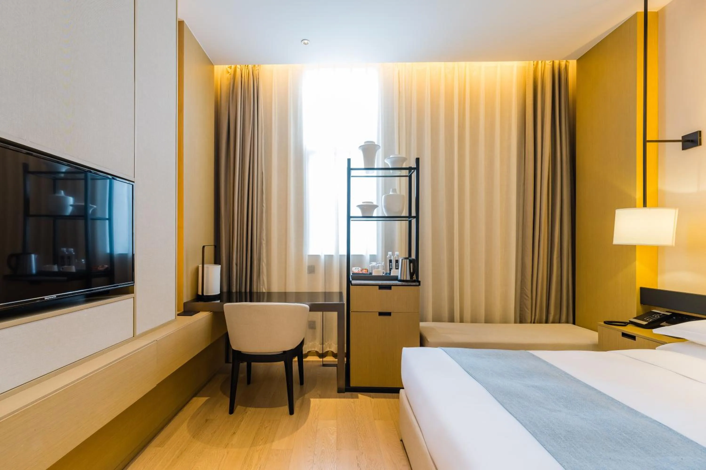 Bed in Yun He Ye Bo Hotel (Shanghai International Tourist Resort Wild Animal Park)