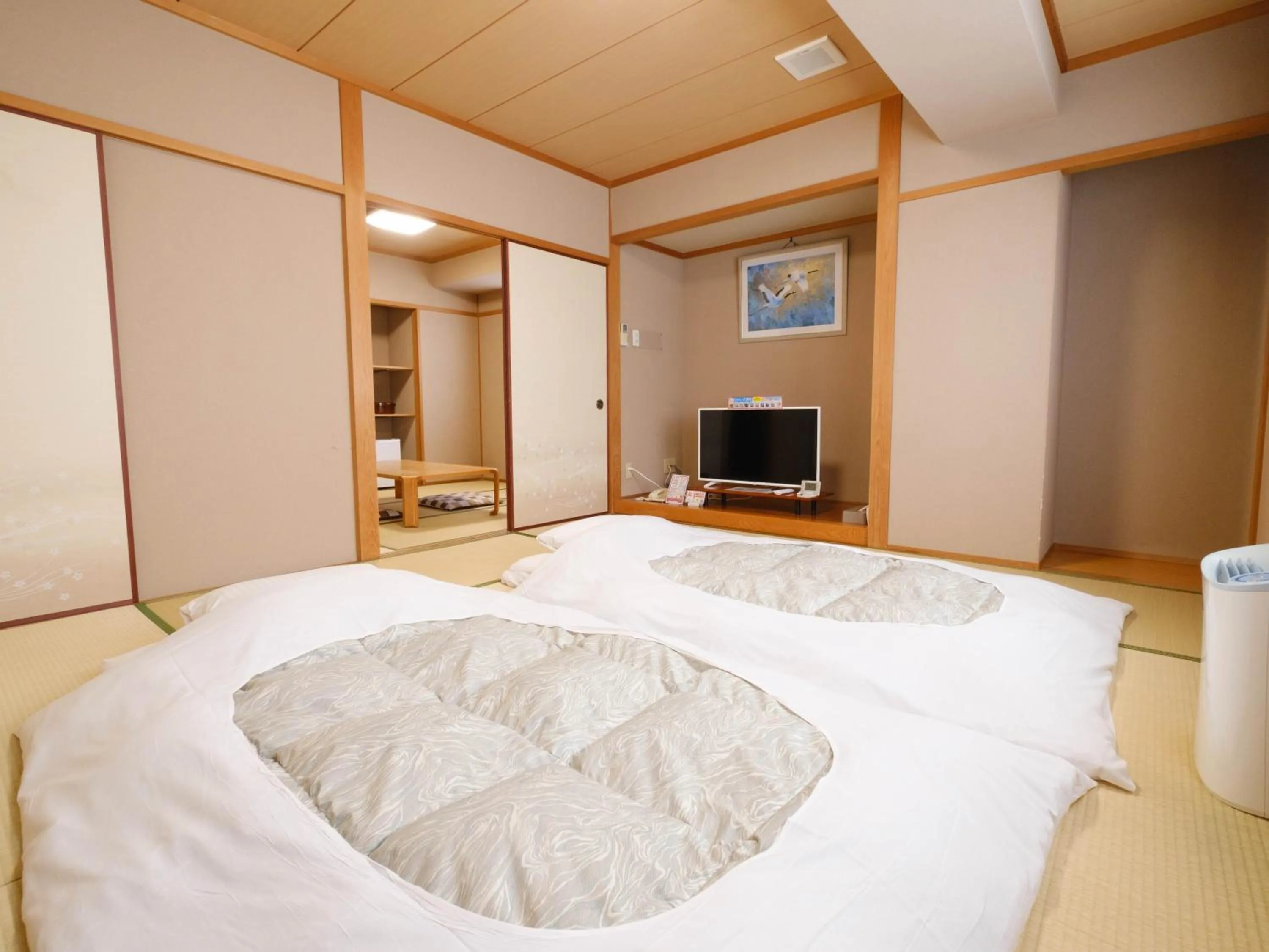 Photo of the whole room, Bed in 天然温泉 松山ニューグランドホテル