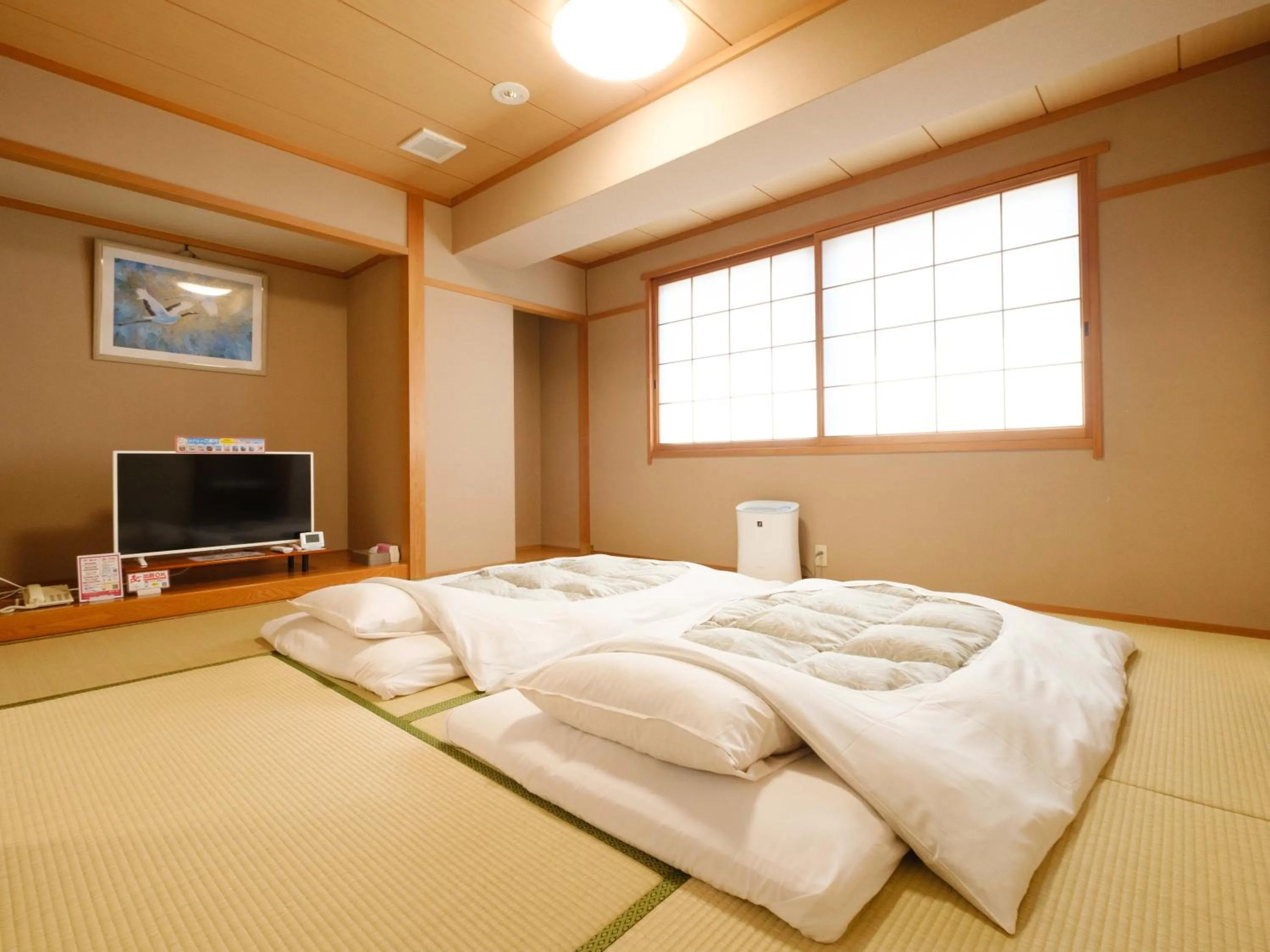 Photo of the whole room, Bed in 天然温泉 松山ニューグランドホテル