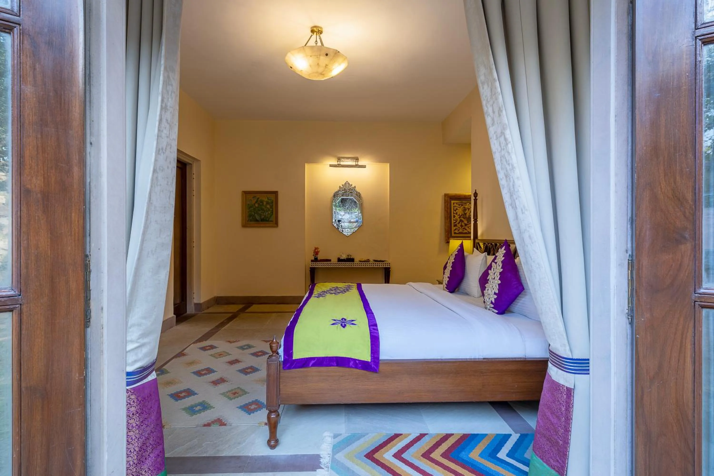 Bedroom, Bed in Tree of Life Resort & Spa Jaipur