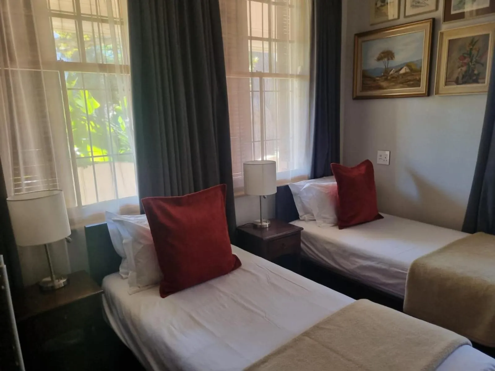 Bed in Ashanti Gardens Guesthouse