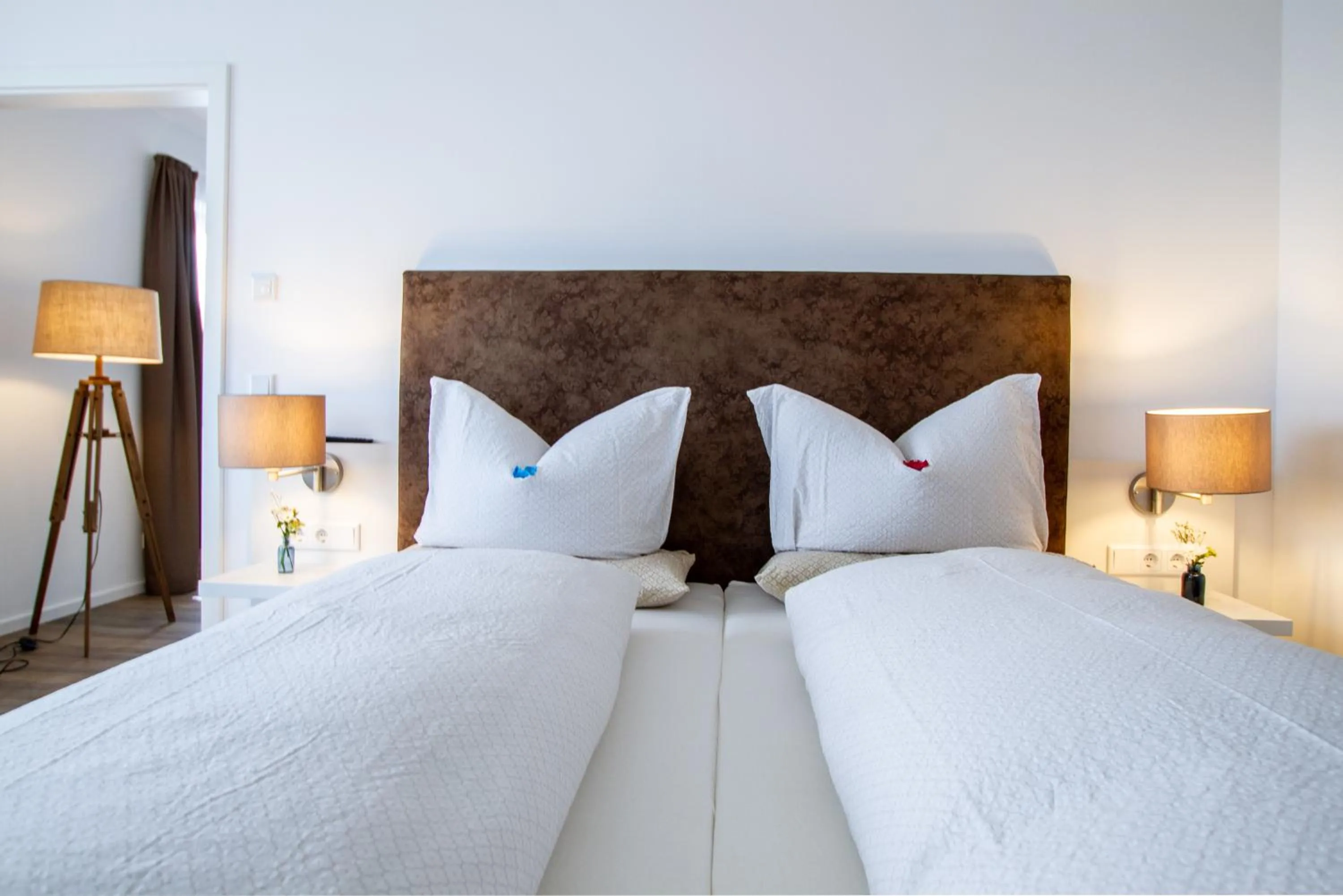 Bed in Appartements an der Golfanlage