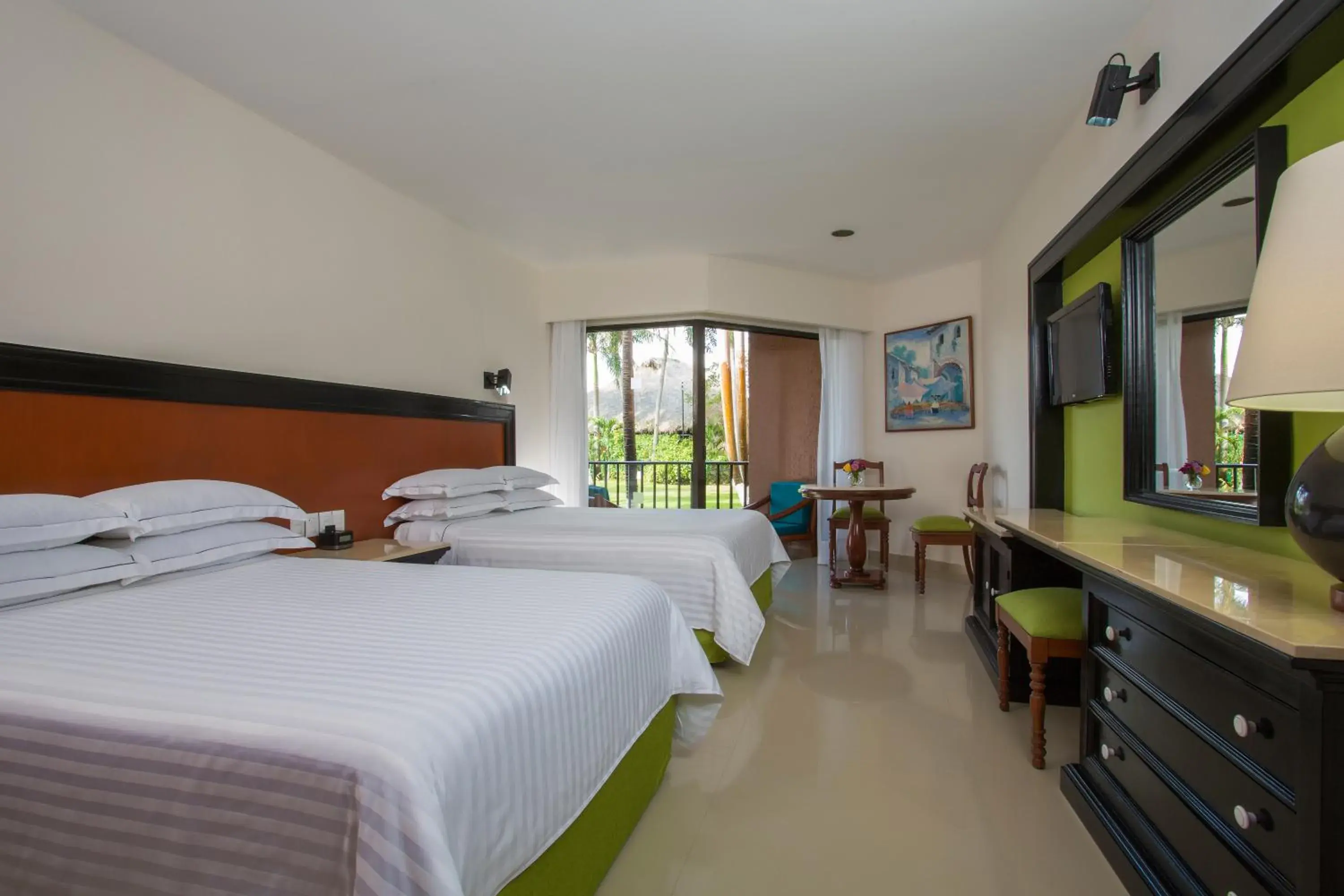 Deluxe Double Room (3 adults + 1 child) in Barceló Huatulco - All Inclusive Deluxe Double Room (3 adults + 1 child) in Barceló Huatulco - All Inclusive