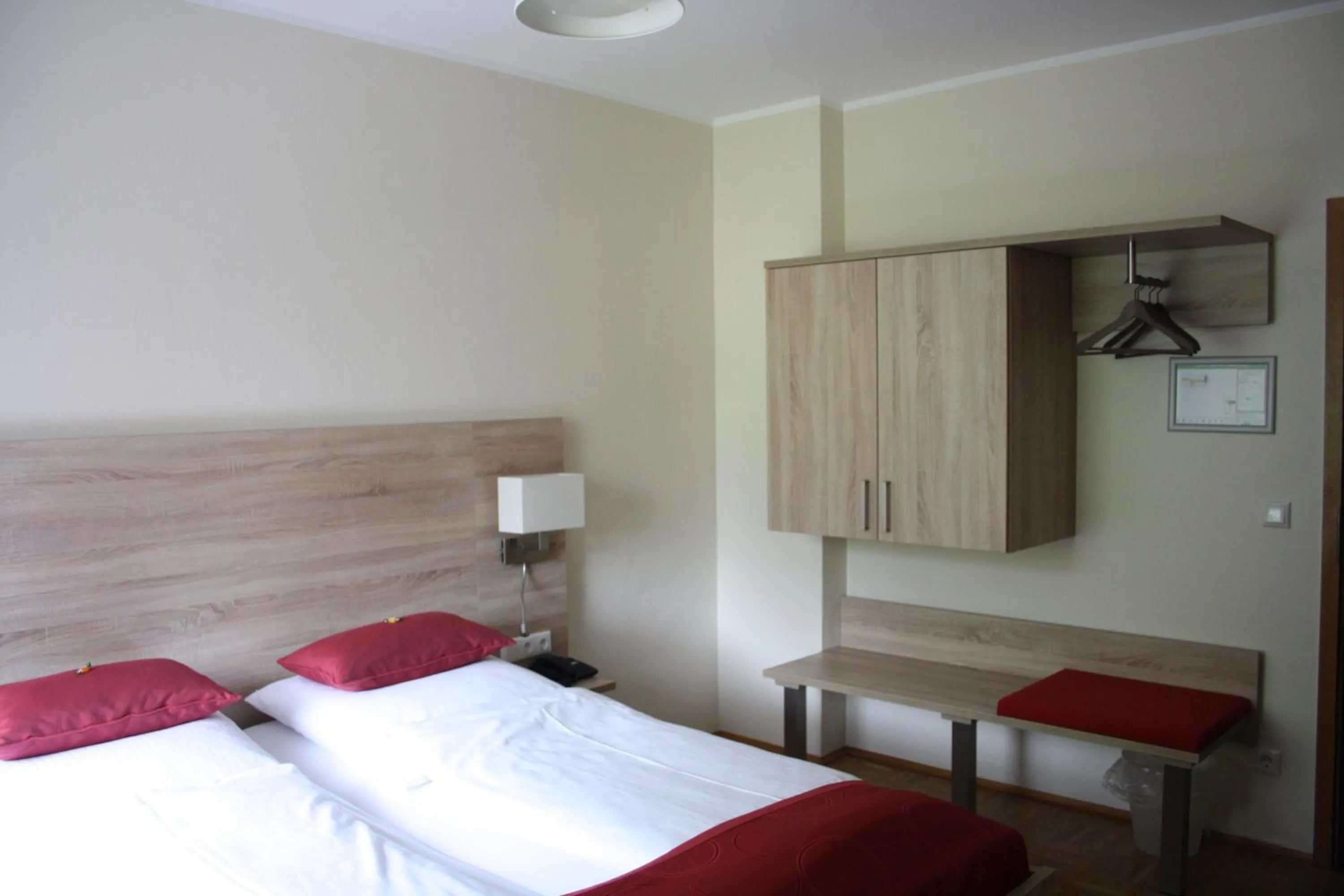 Photo of the whole room, Bed in Hotel Schwarzer Adler