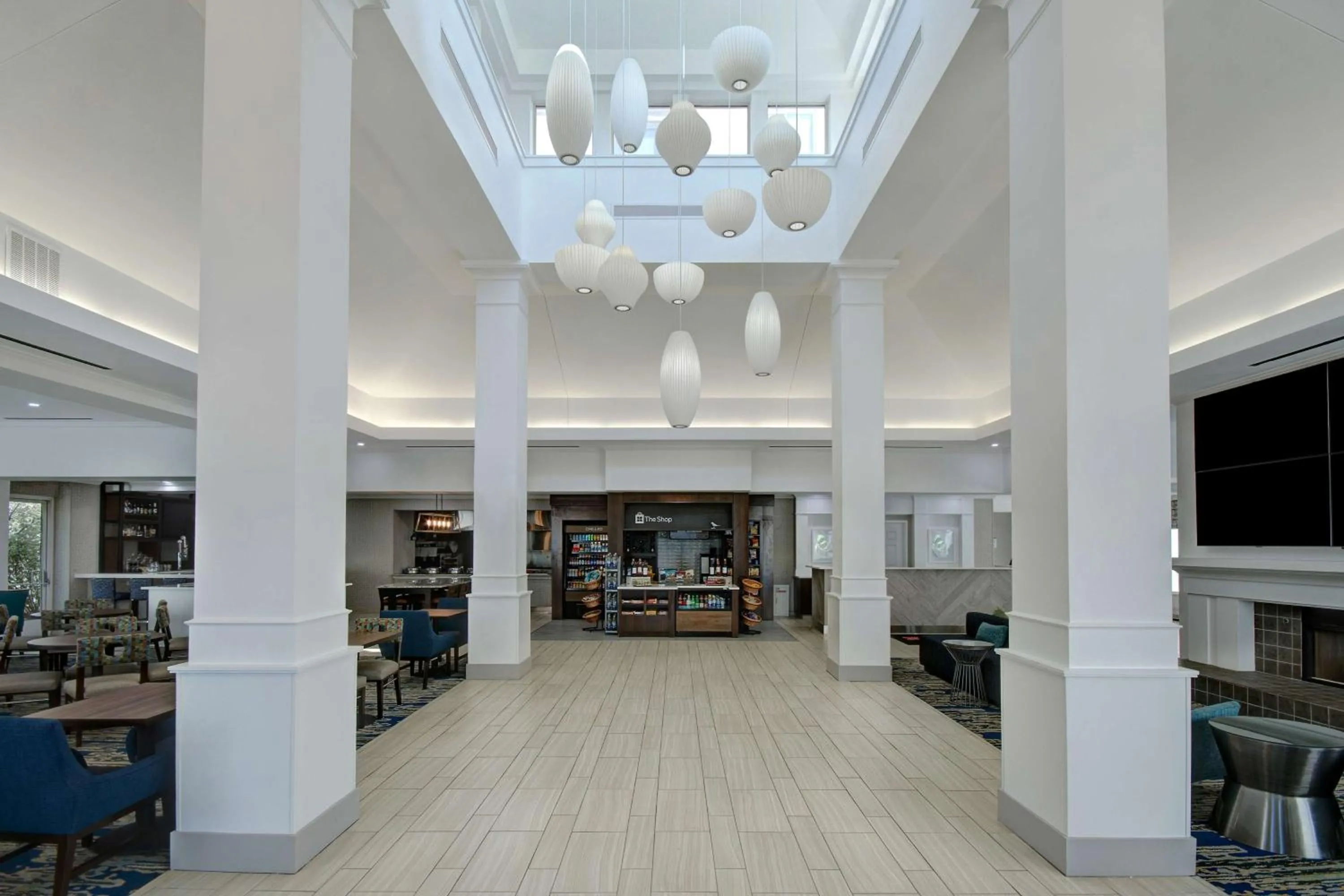 Lobby or reception in Hilton Garden Inn Detroit Metro Airport