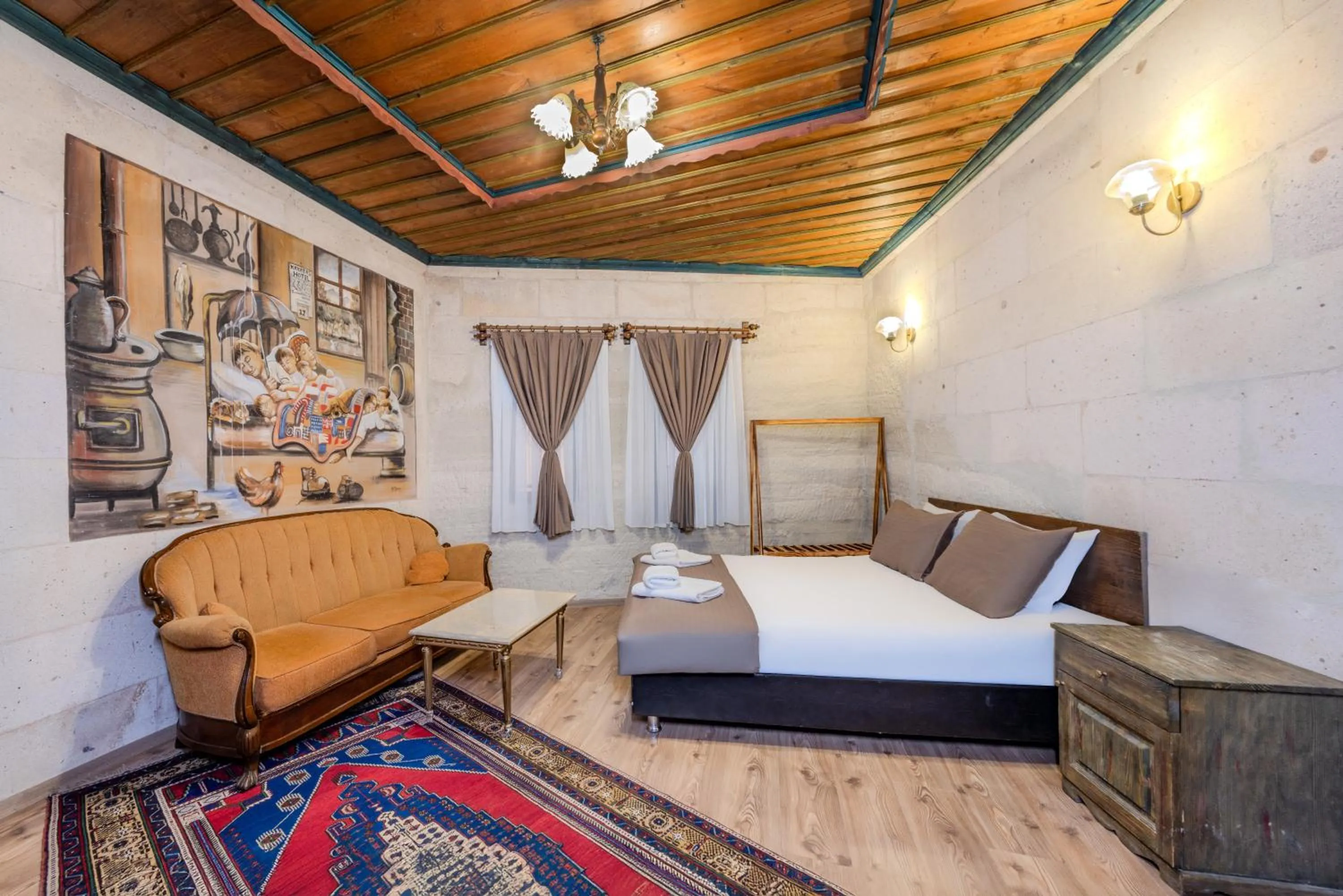 Bed in Kayatas Cave Suites