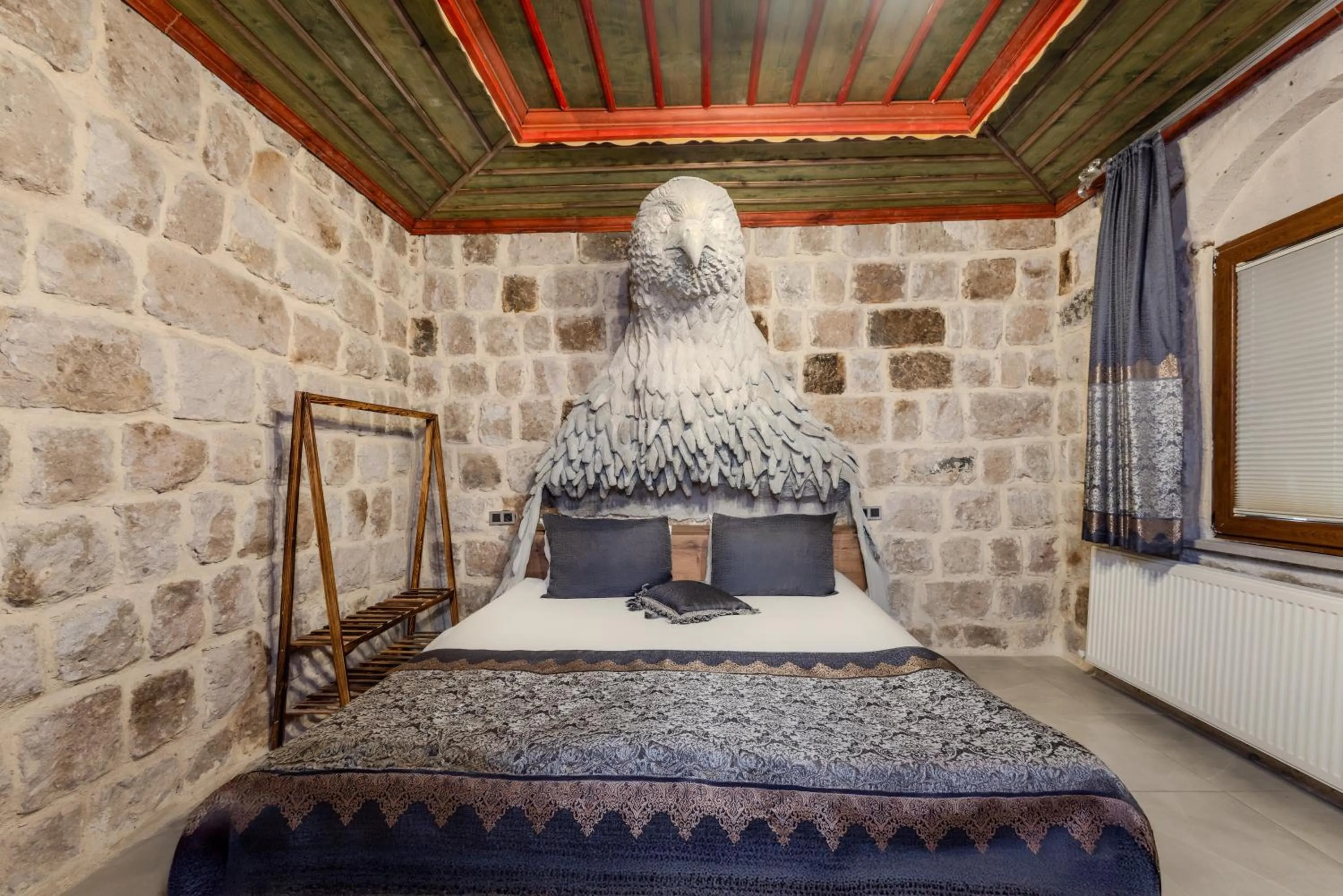 Bed in Kayatas Cave Suites