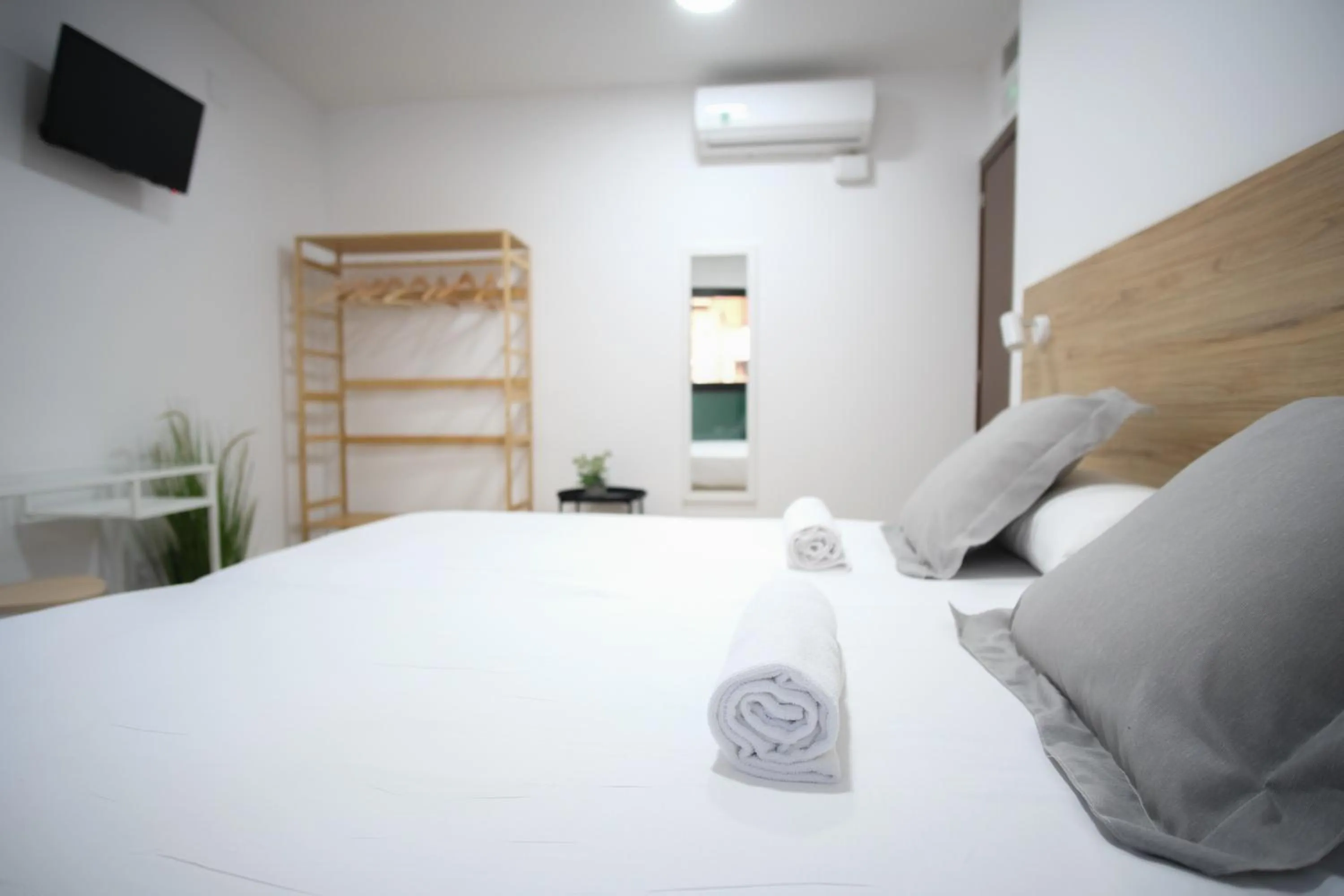 Bed in Urban Rooms Alicante