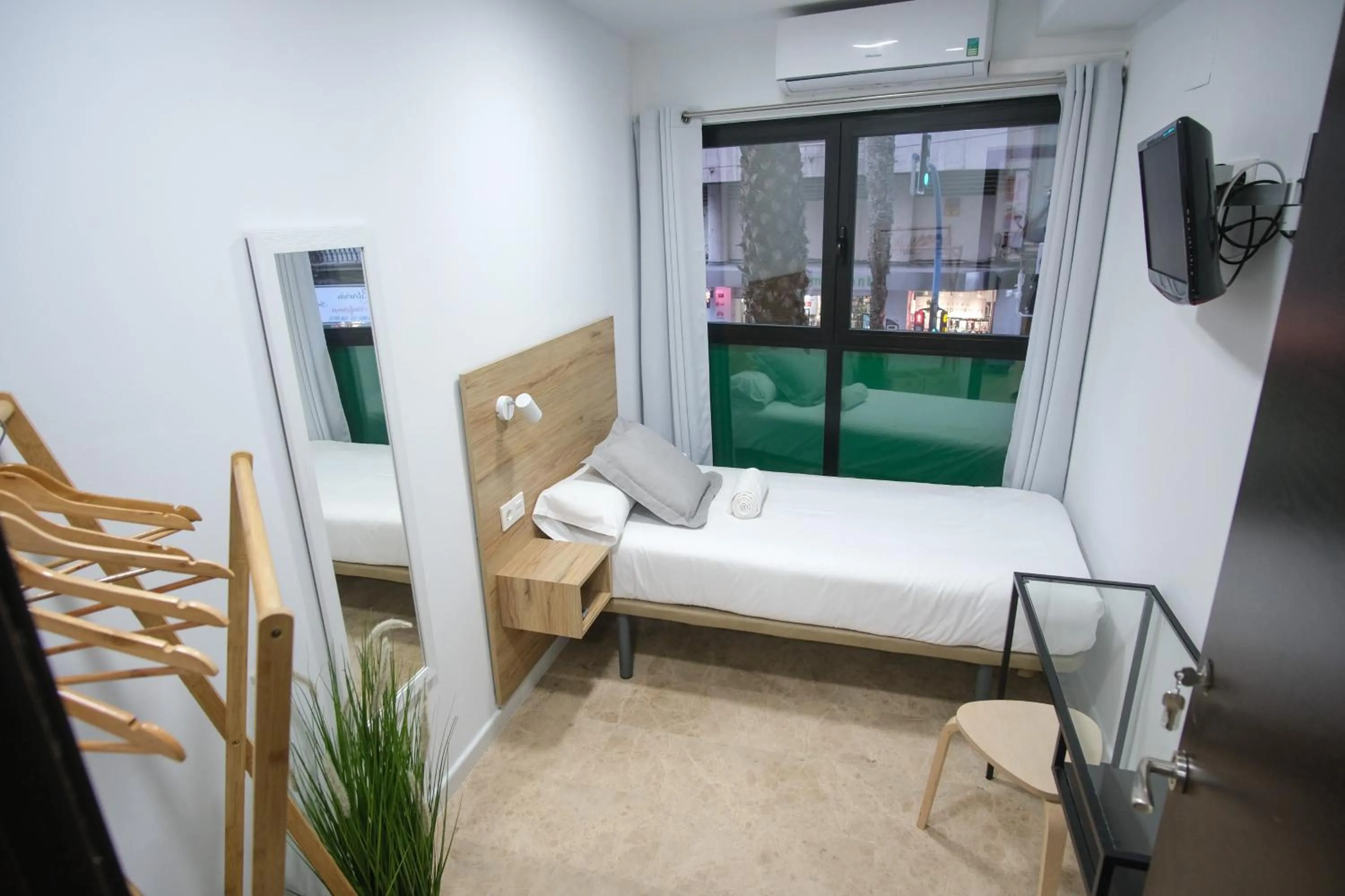 Bed in Urban Rooms Alicante