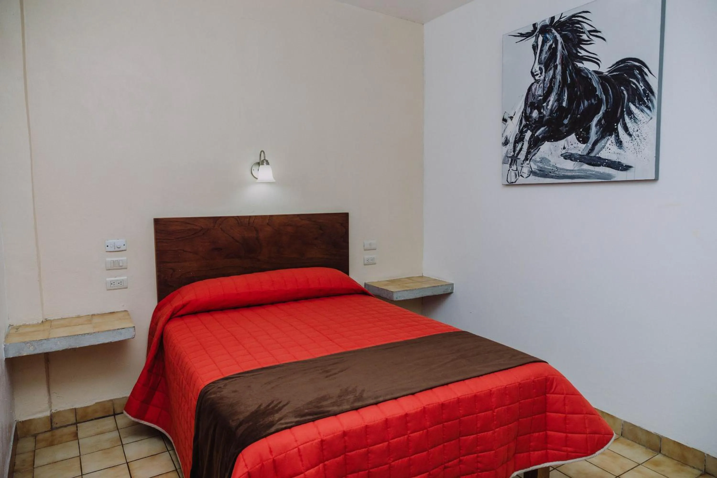 Bed in Hotel Cervantino