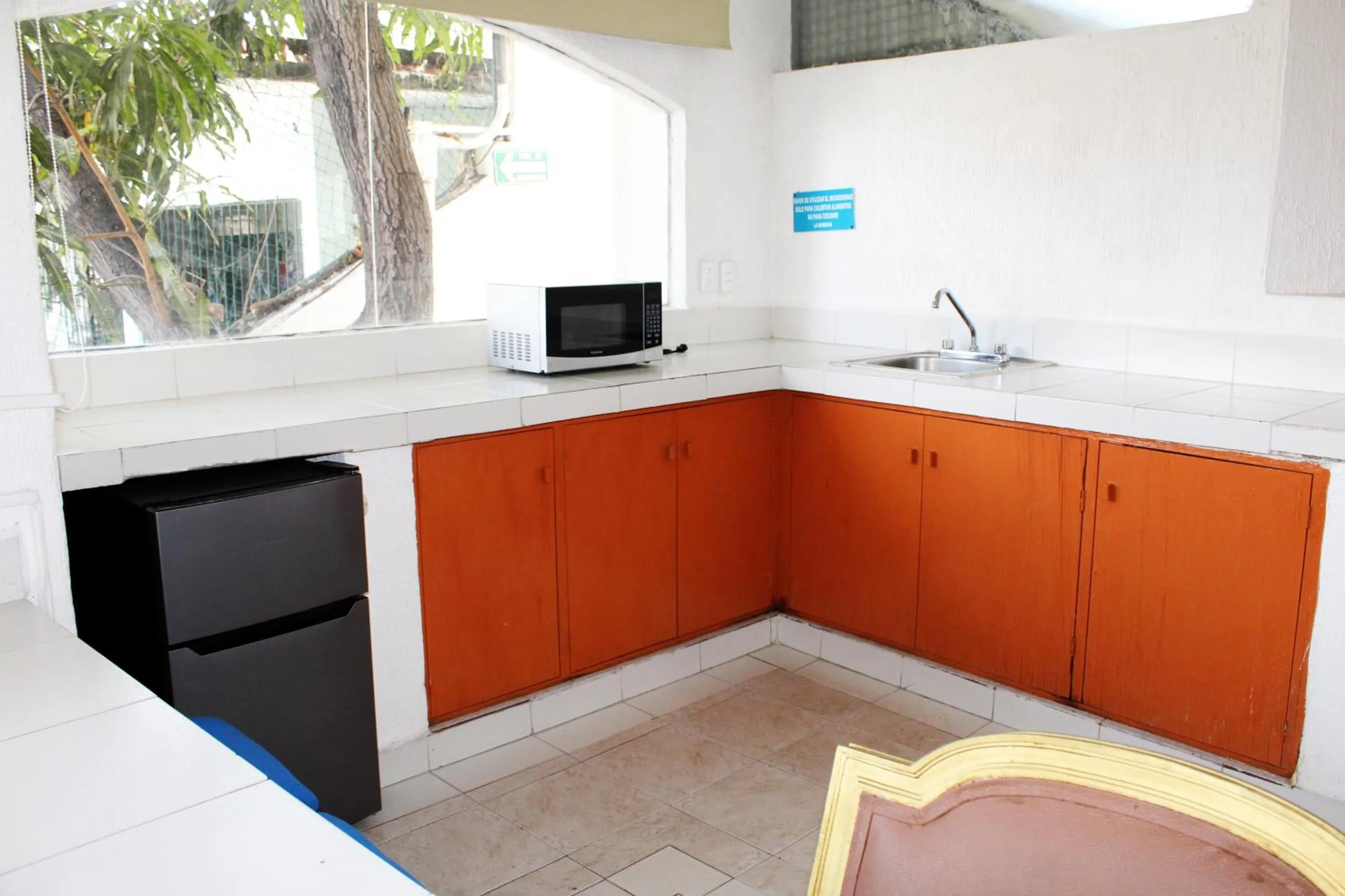 Kitchen or kitchenette in D'Cesar Hotel Acapulco