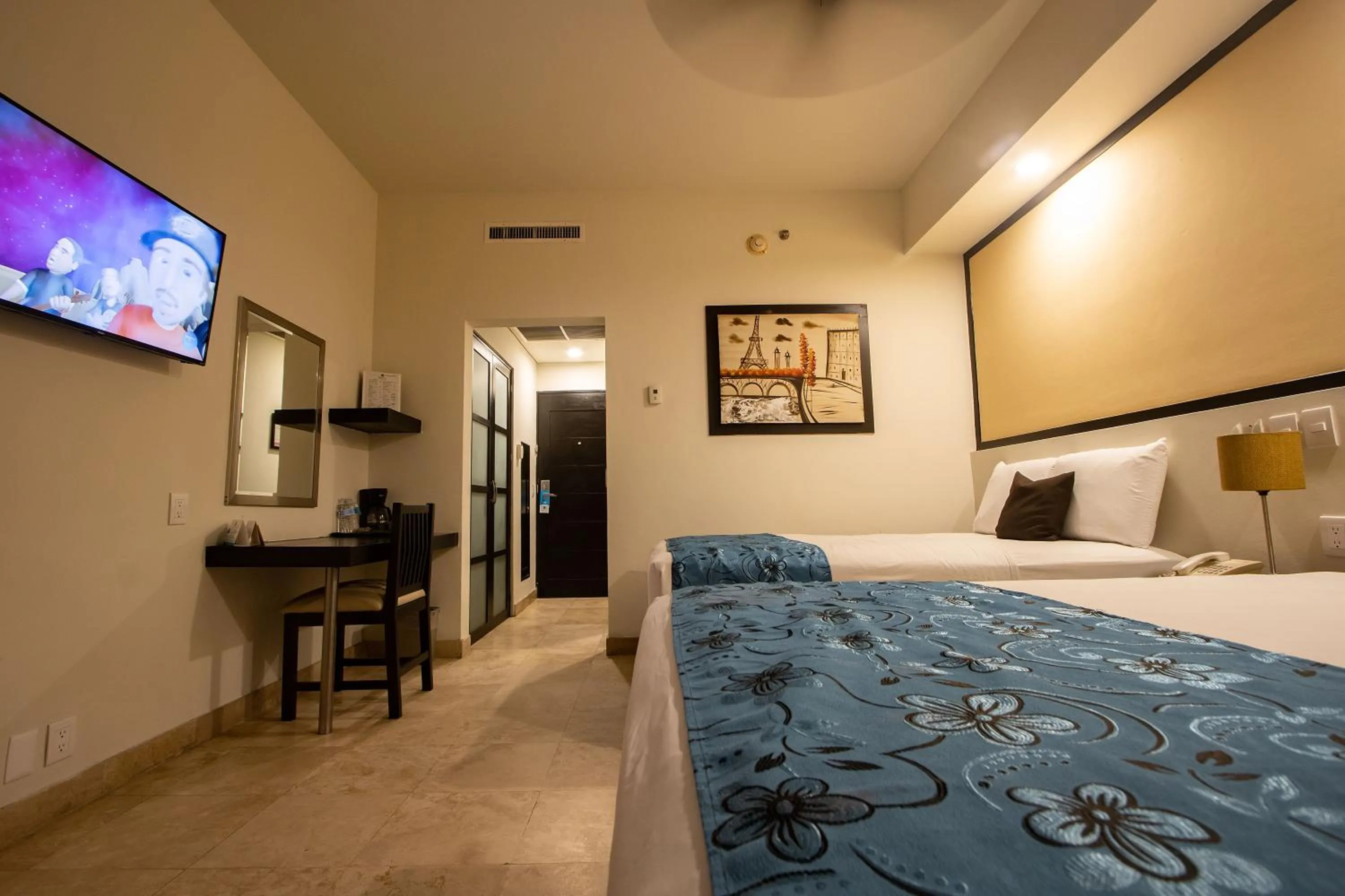 Bed in Coral Island Beach View Hotel