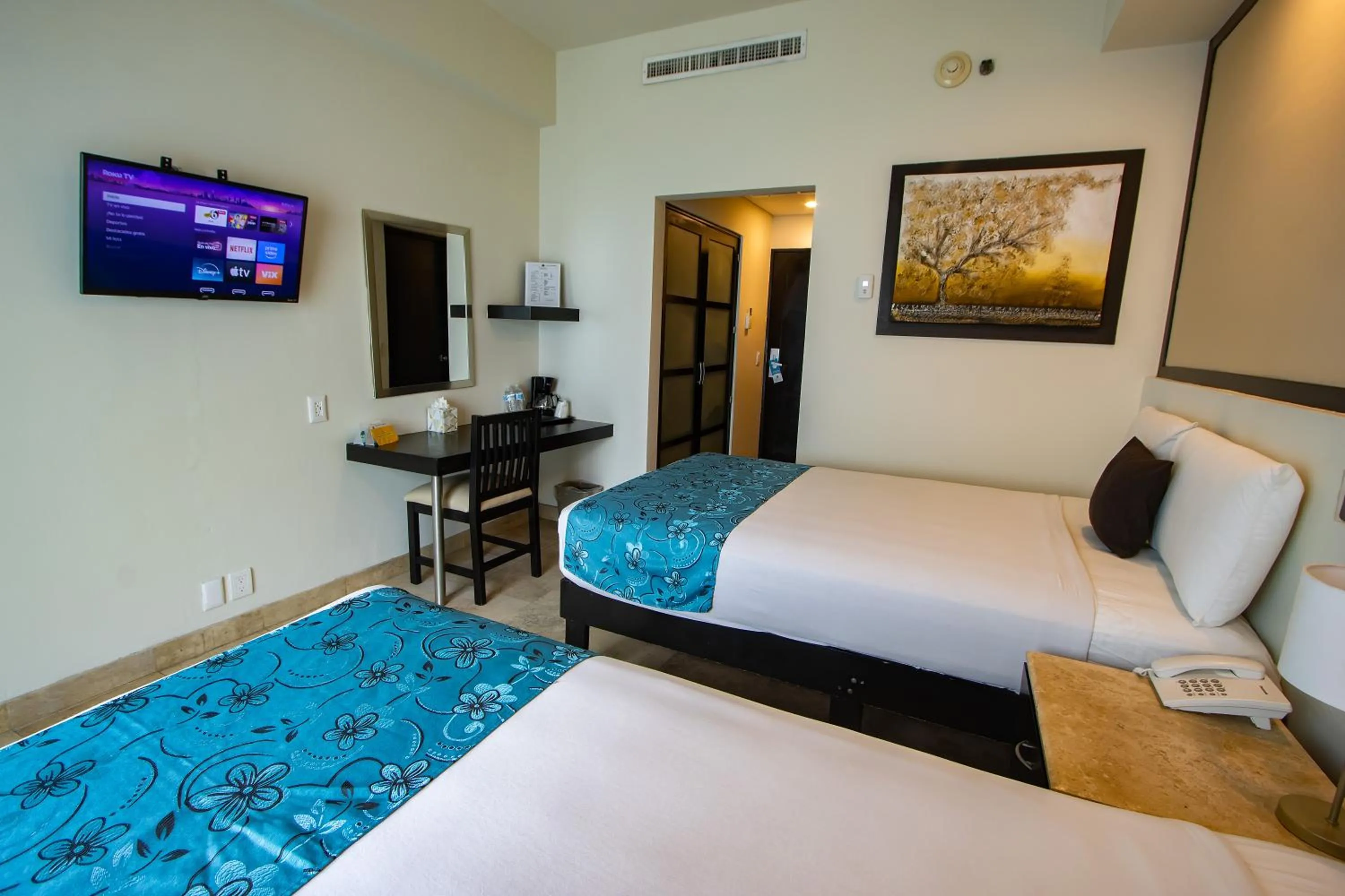 Bed in Coral Island Beach View Hotel