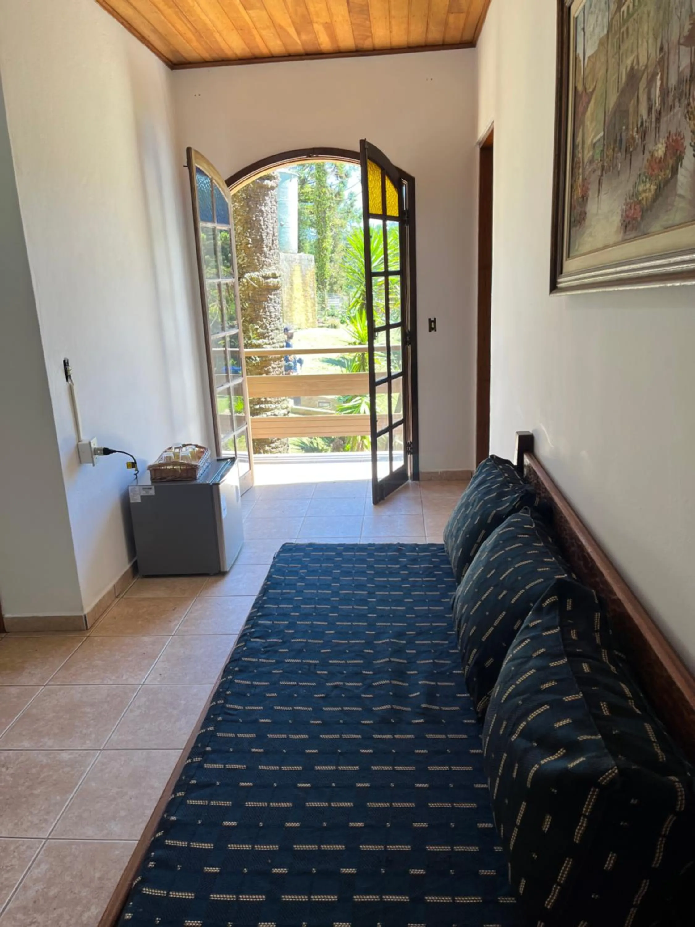 Seating area, Bed in Pousada Sonho Verde
