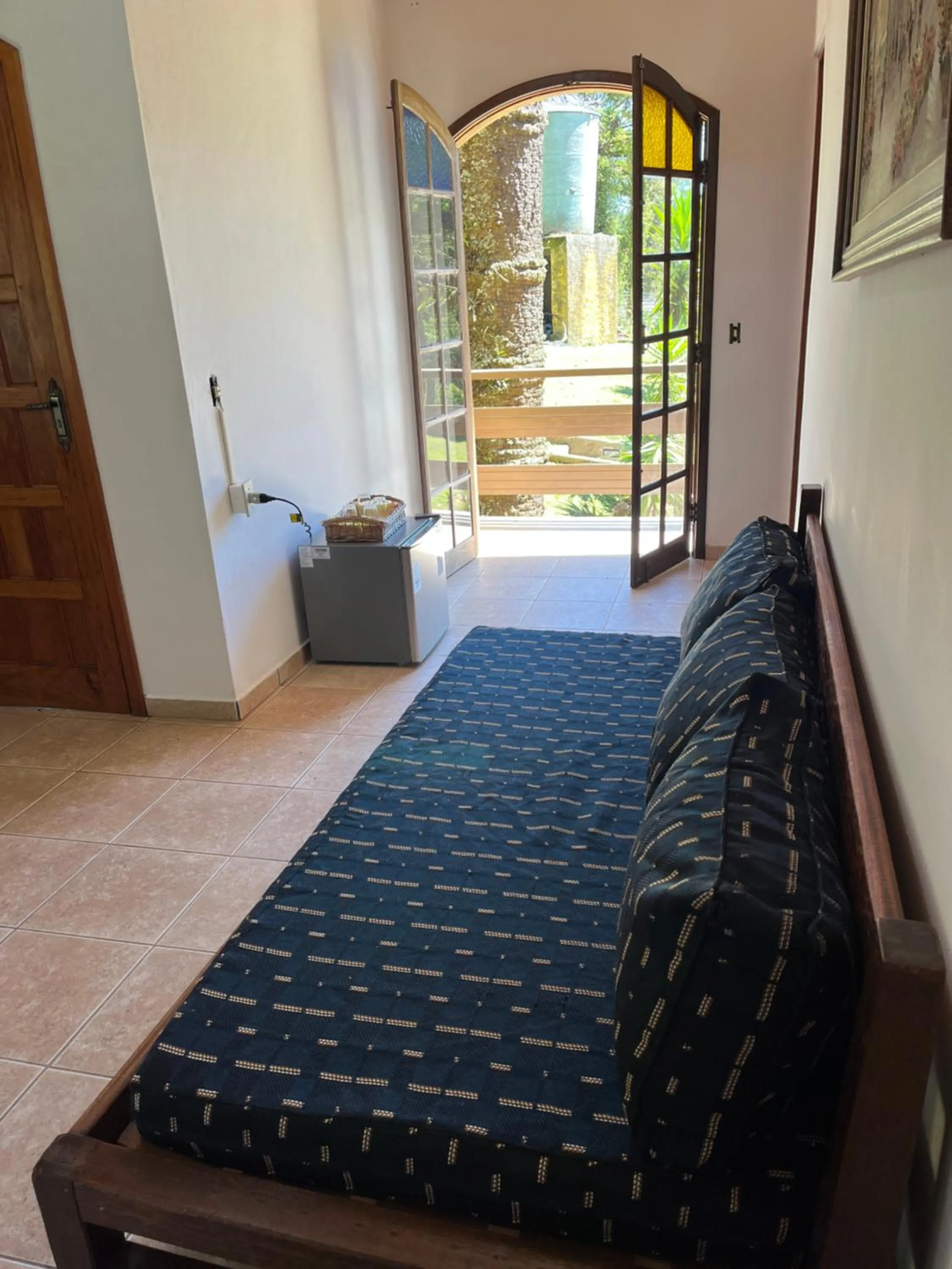 Seating area, Bed in Pousada Sonho Verde