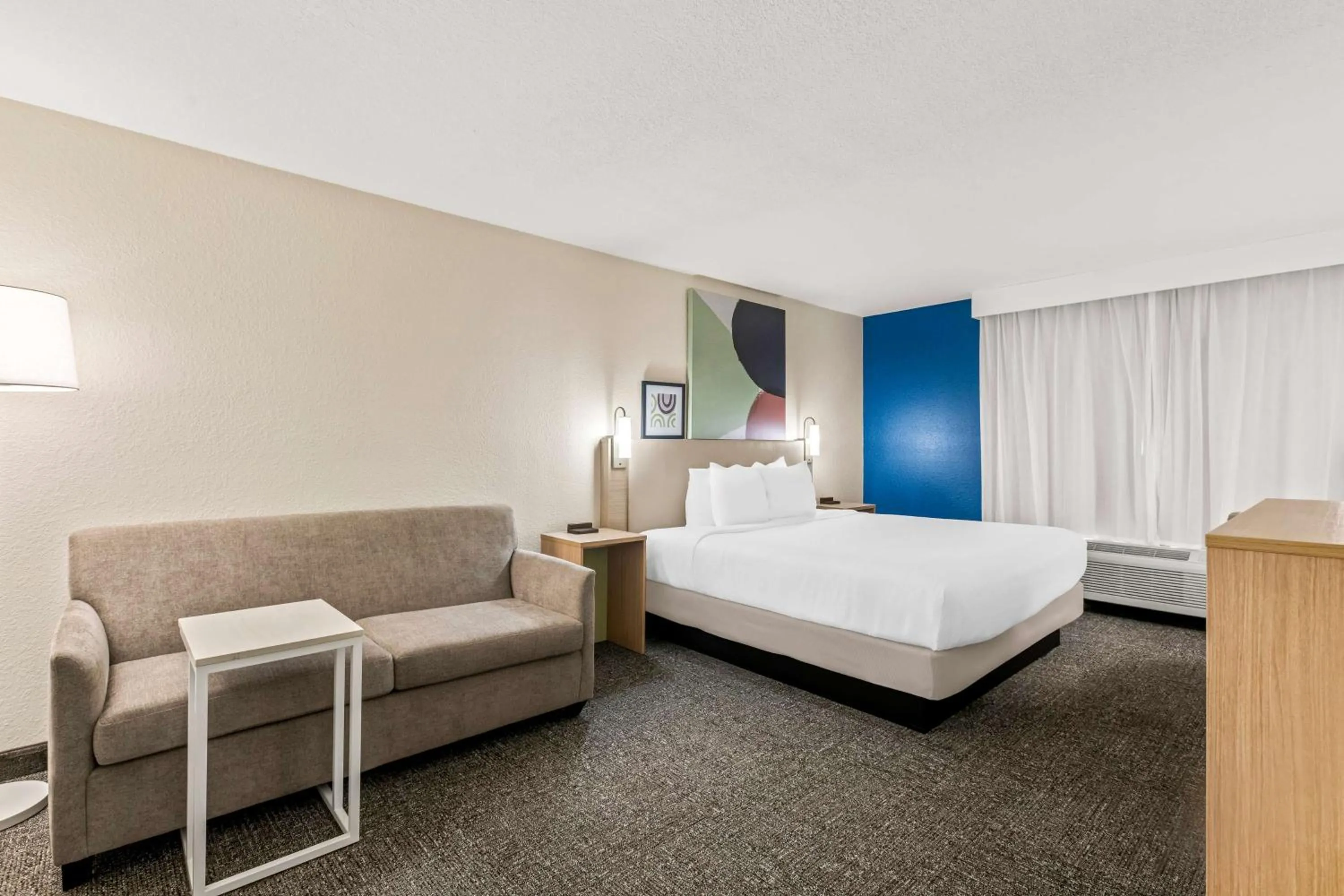 Living room, Bed in Spark by Hilton Port Wentworth Savannah