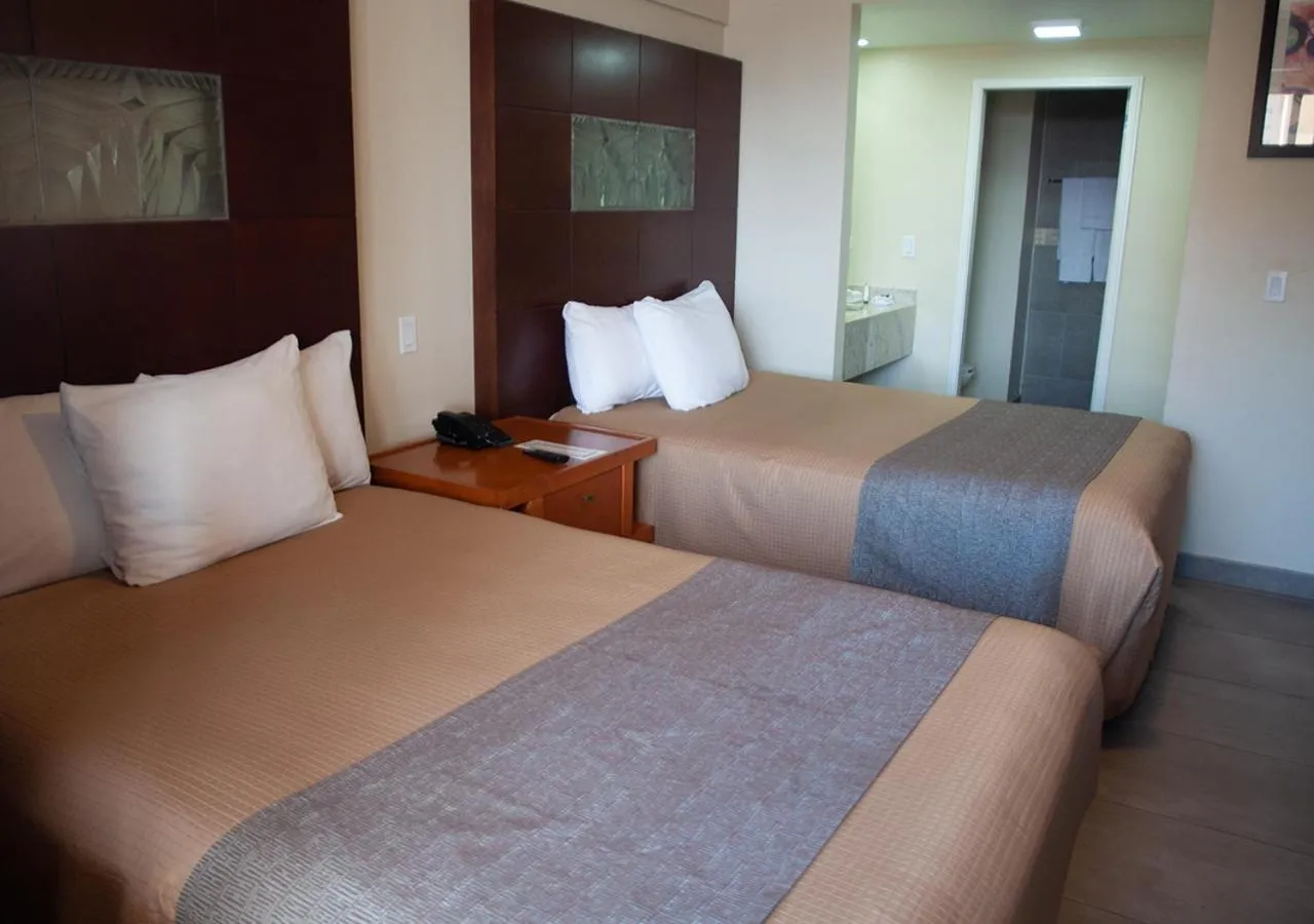 Bedroom, Bed in Del Mar Inn Rosarito