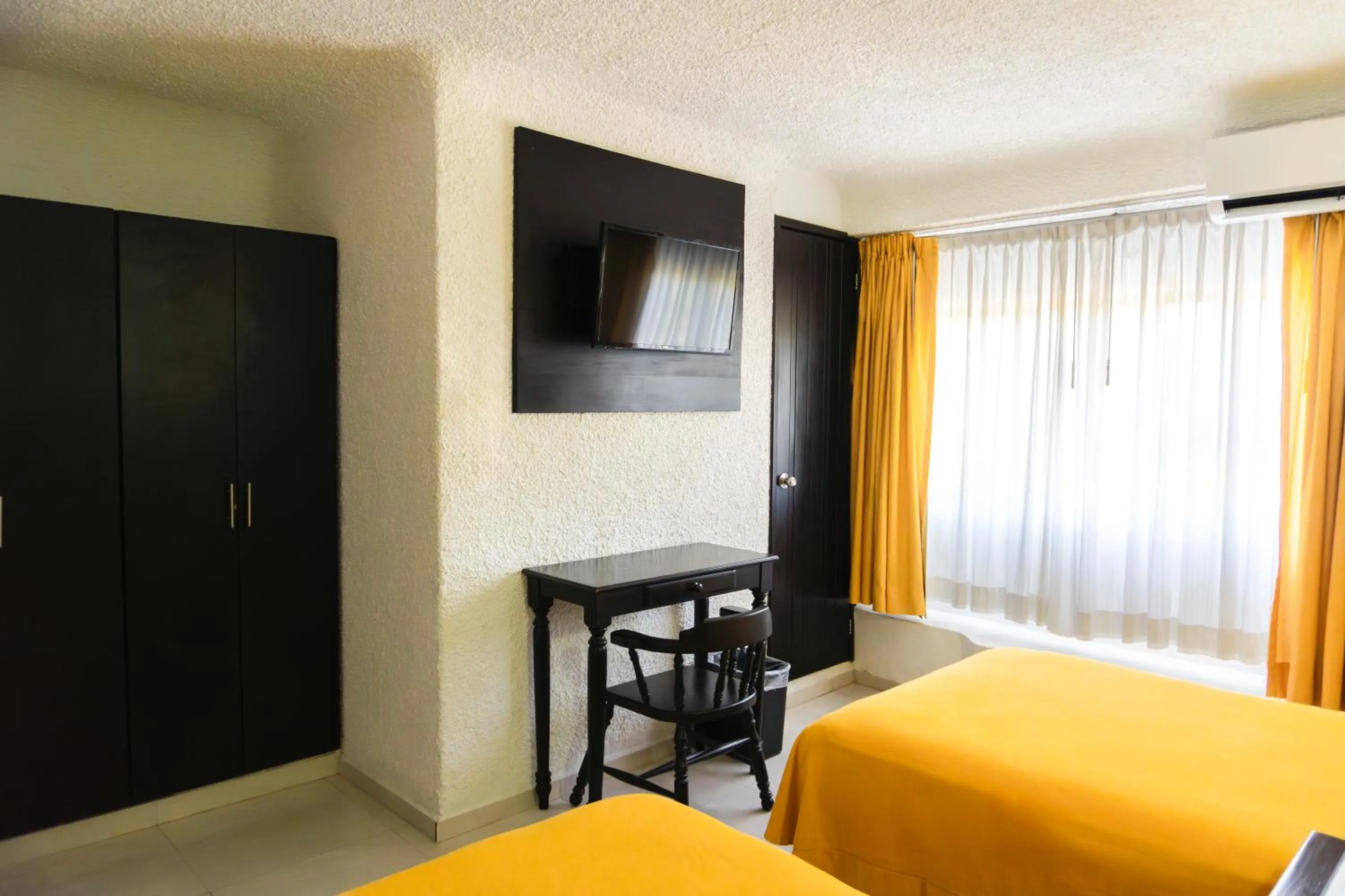 Bed in Hotel Antillano