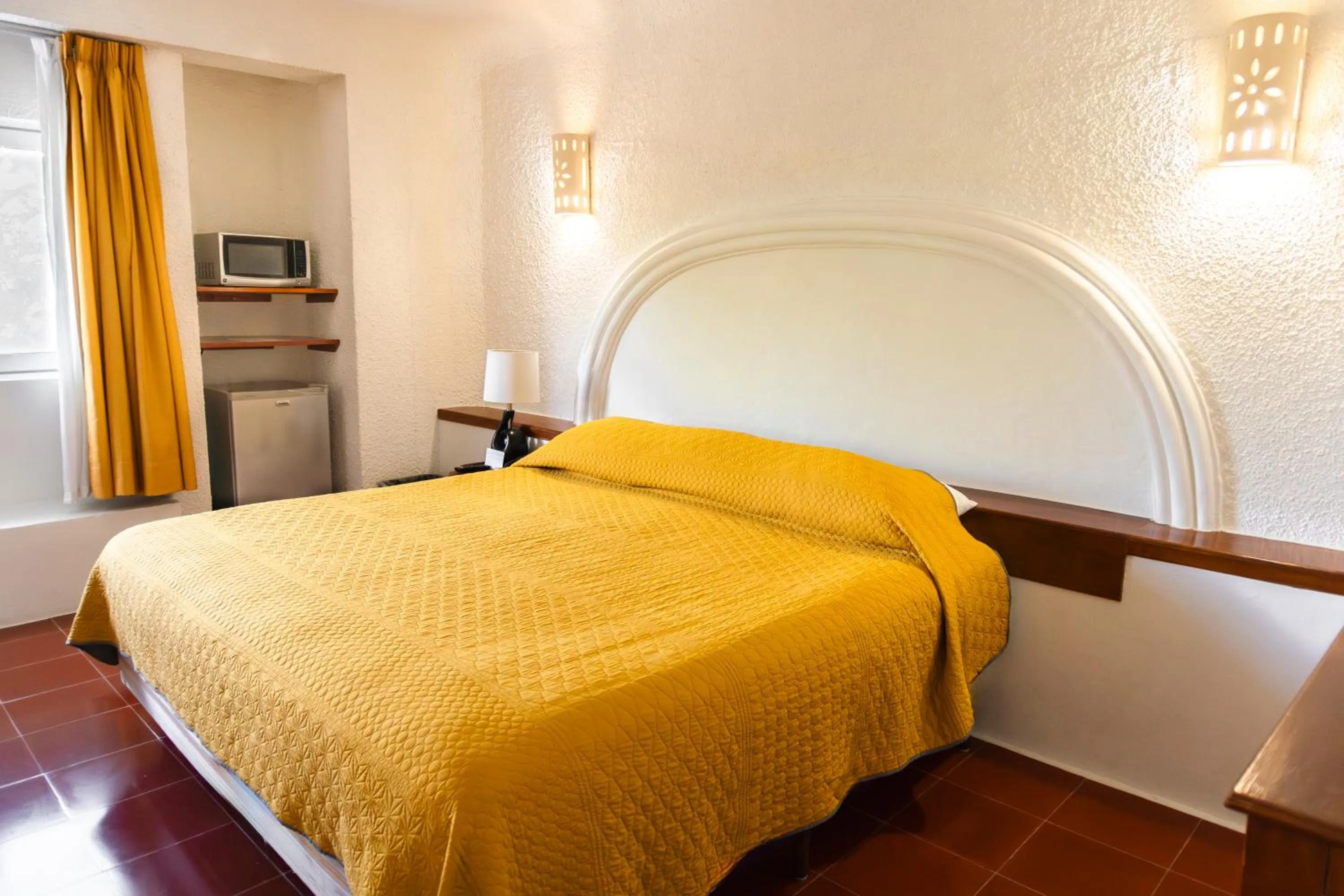 Bed in Hotel Antillano