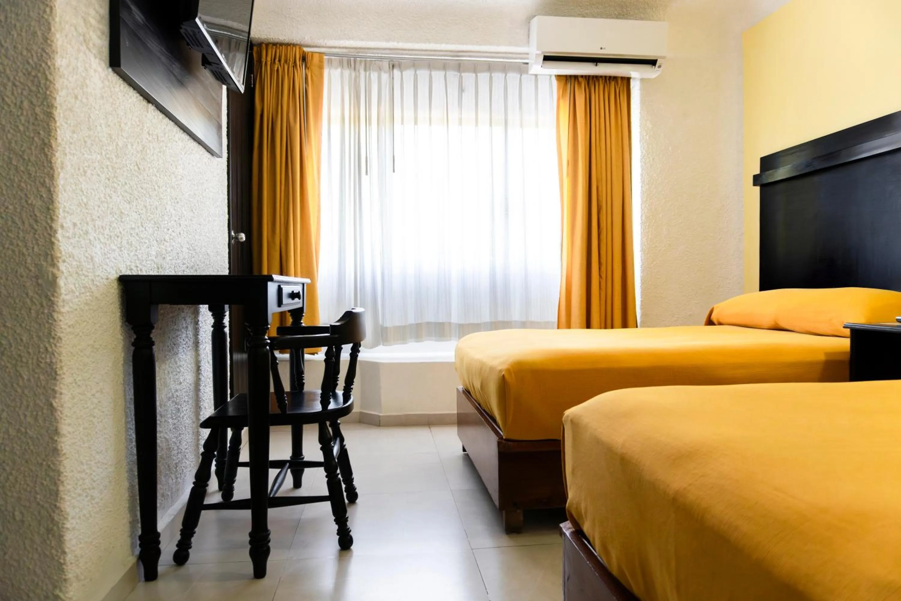 Bed in Hotel Antillano