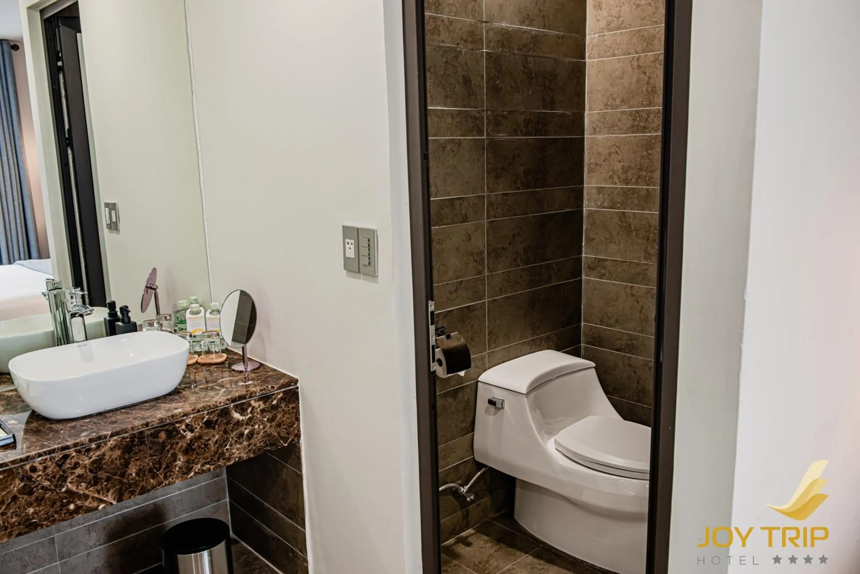 Toilet in Joy Trip Hotel & Spa Nha Trang