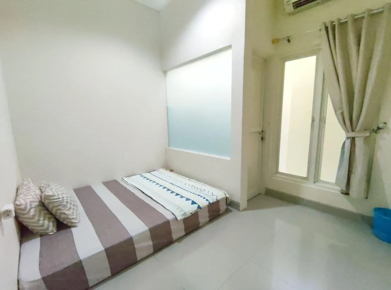 Bed in Surabaya Homey near Juanda Airport Syariah