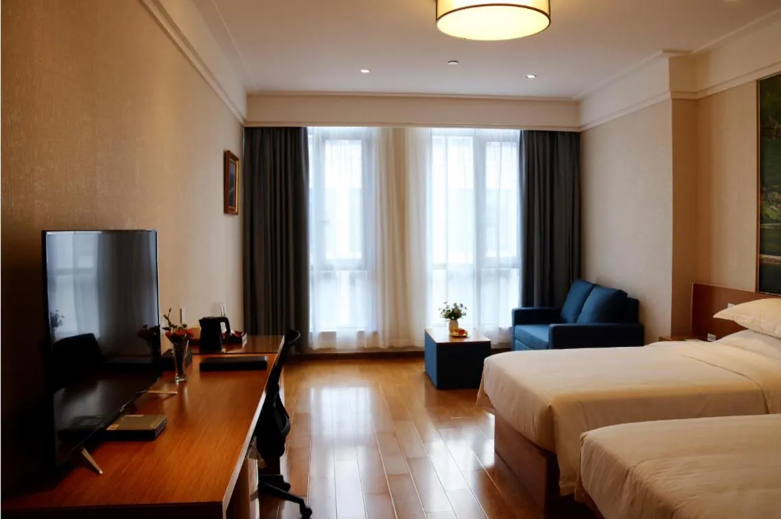 Bed in Linjiang International Cruise Hotel Baoyang Road